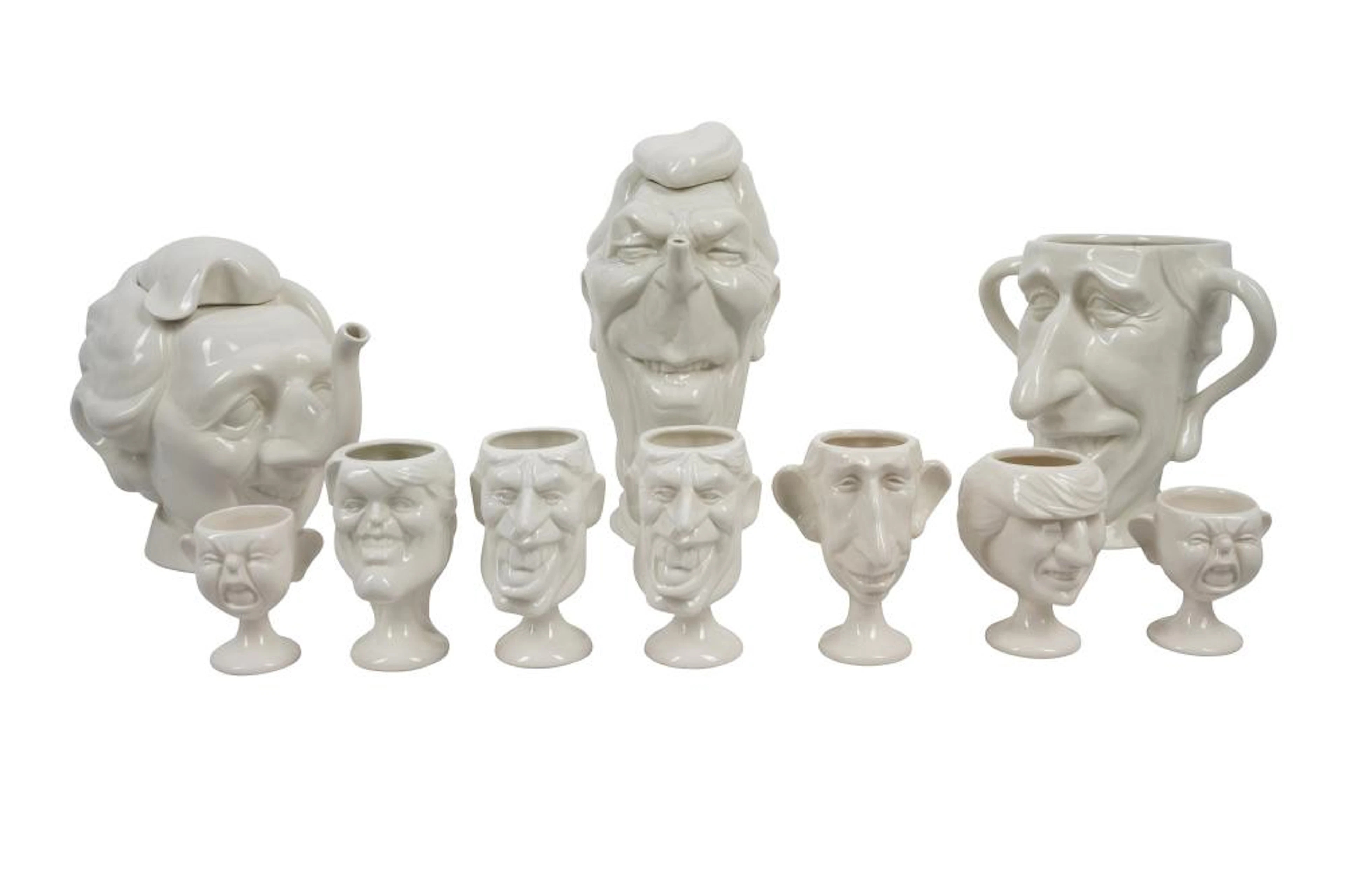 A GROUP OF LUCK AND FLAW SPITTING IMAGE ALONG WITH MARX BROTHERS CERAMICS