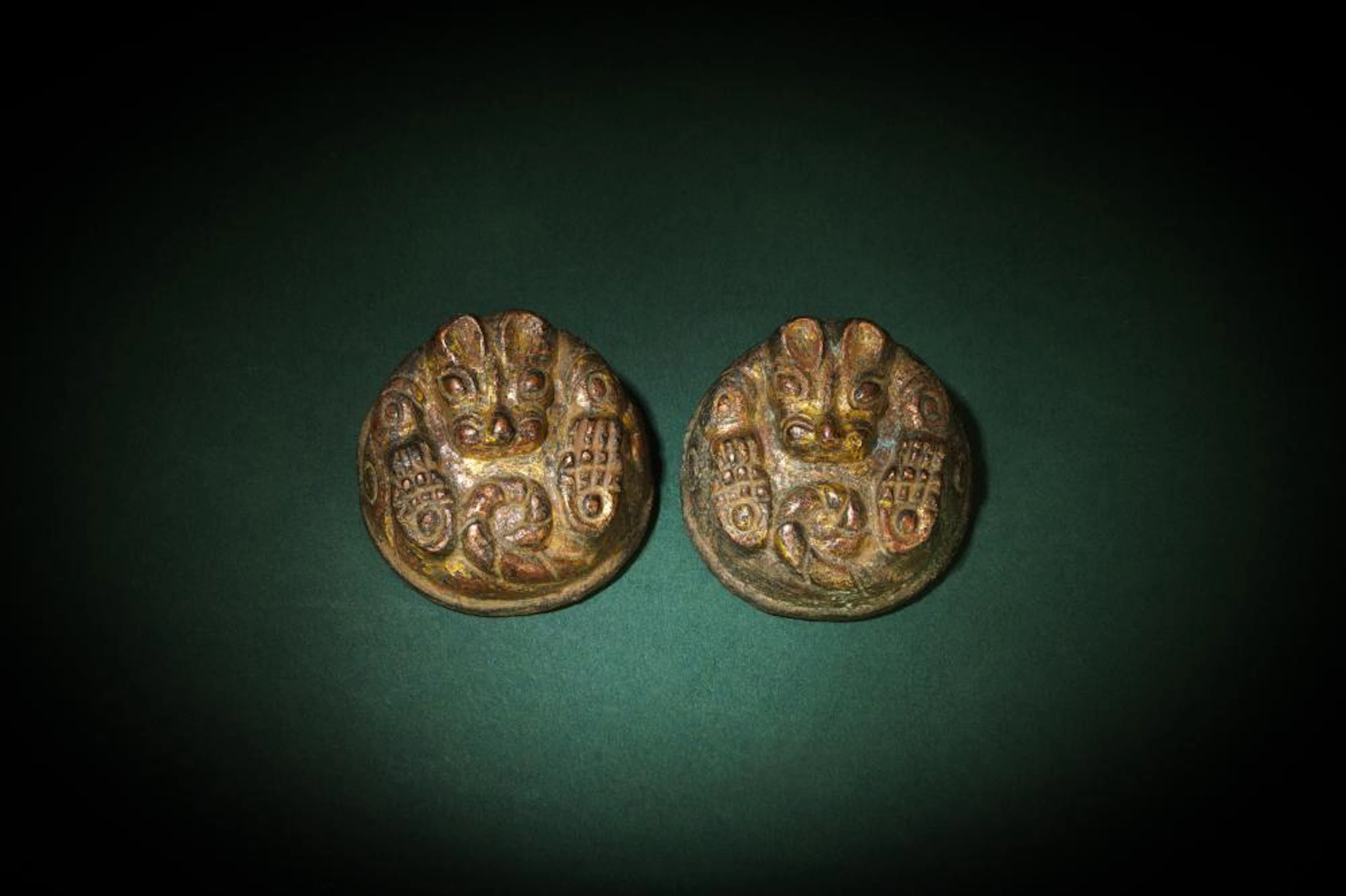 A PAIR OF CHINESE GILT-BRONZE 'BEAR' MAT WEIGHTS ?