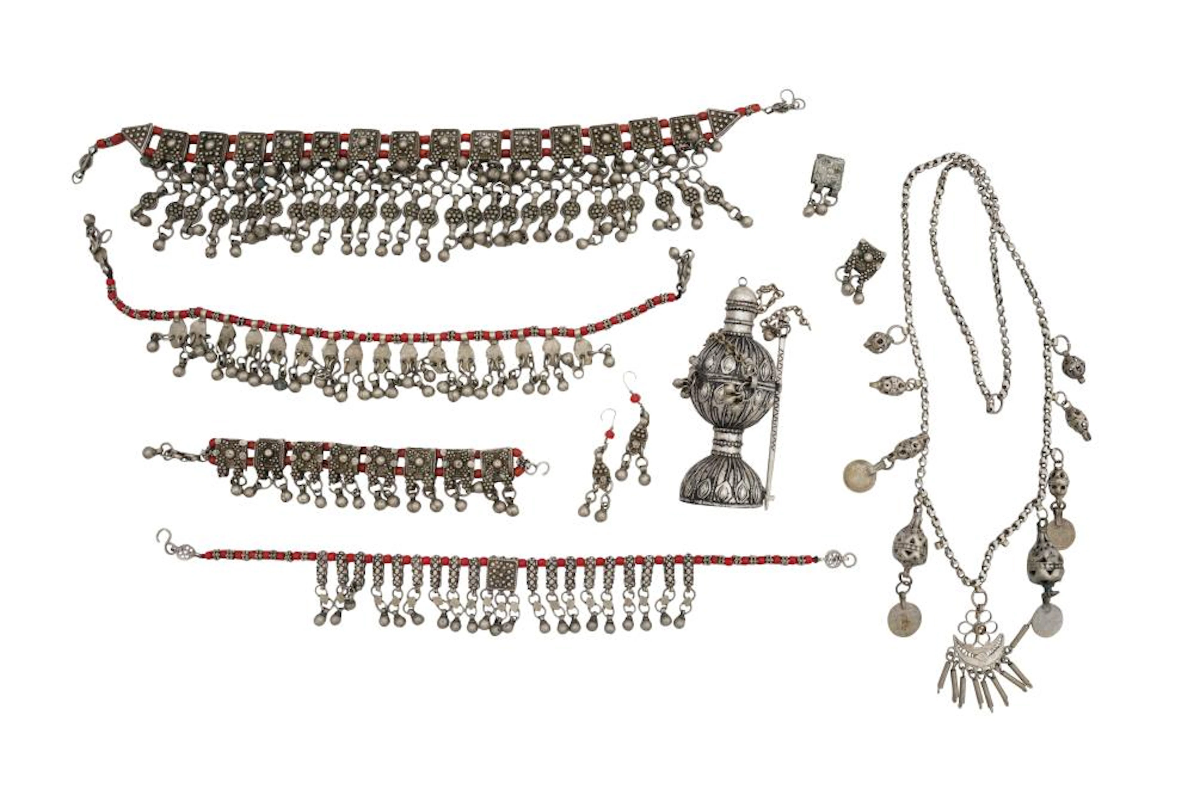 A GROUP OF SILVER JEWELLERY FROM YEME