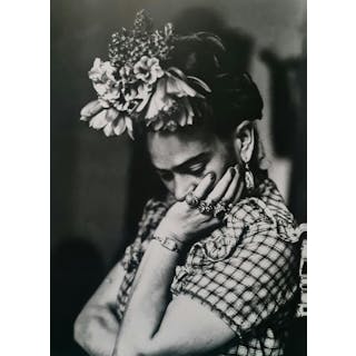 FRIDA KAHLO, LOOKING DOWN IN FLORAL HEADDRESS