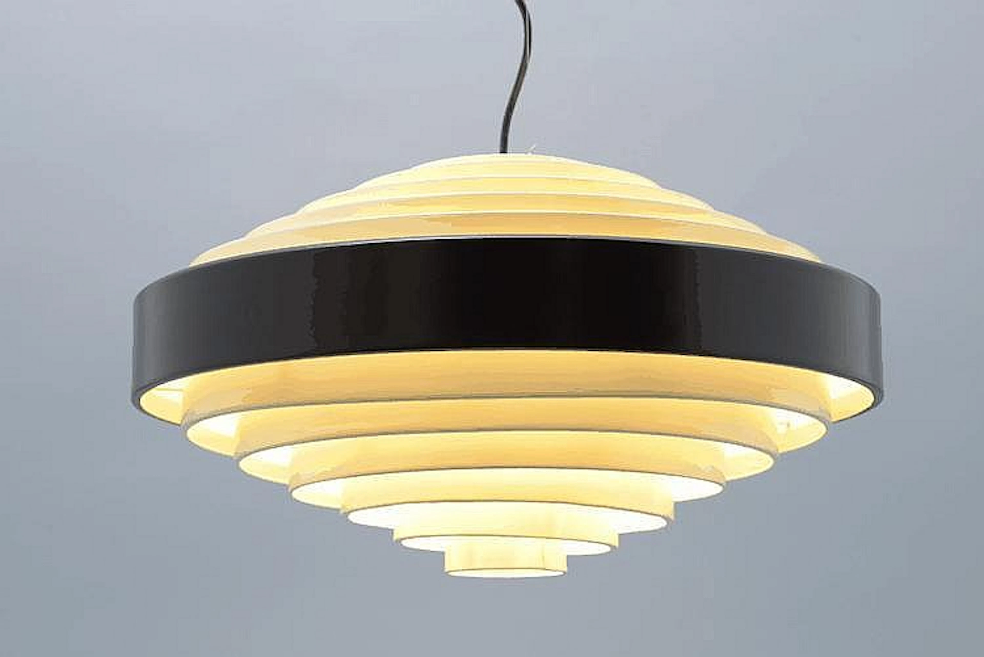 A metal chandelier Stilnovo