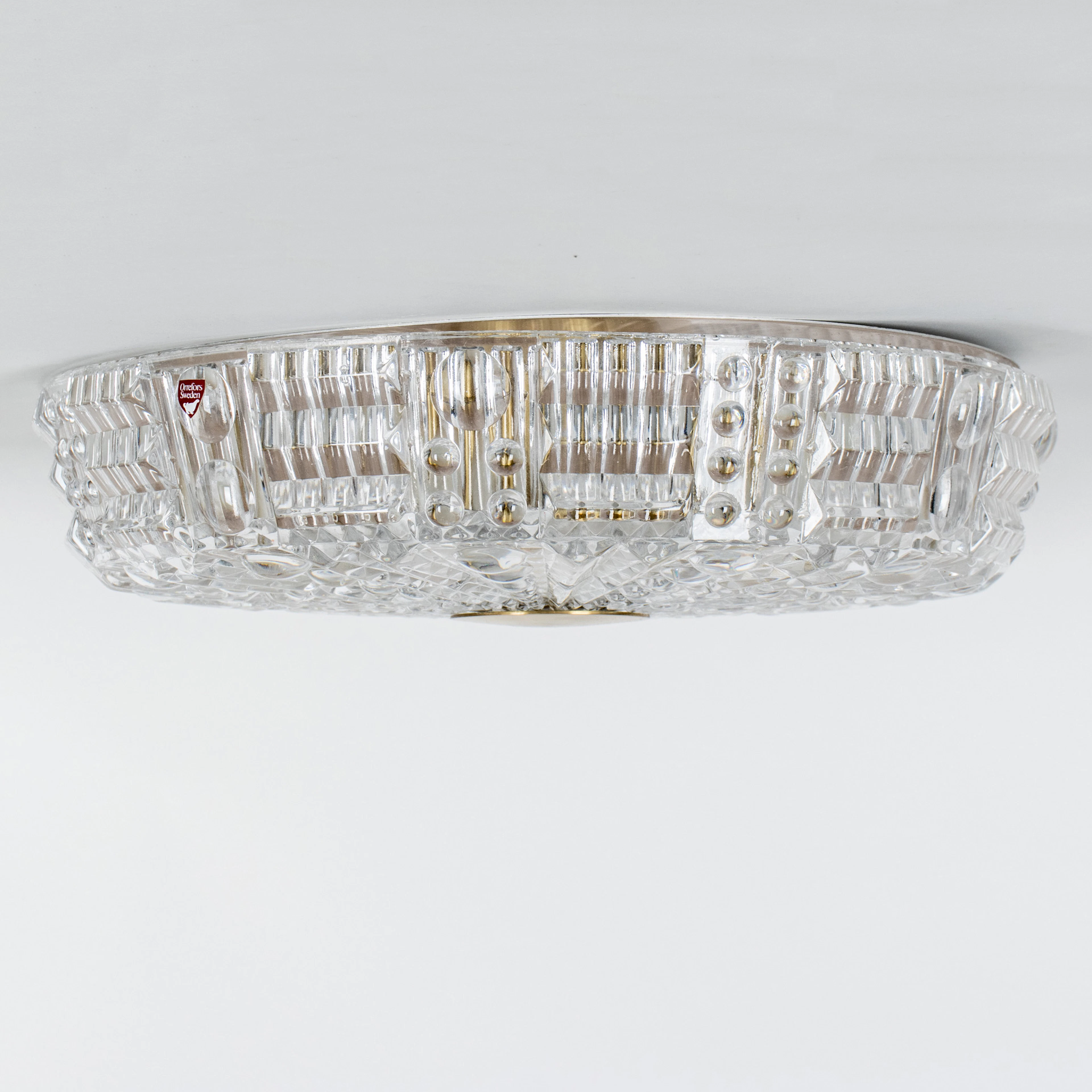 TAKPLAFOND, glas och mässing, Carl Fagerlund, Orrefors, 1900-talets andra hälft