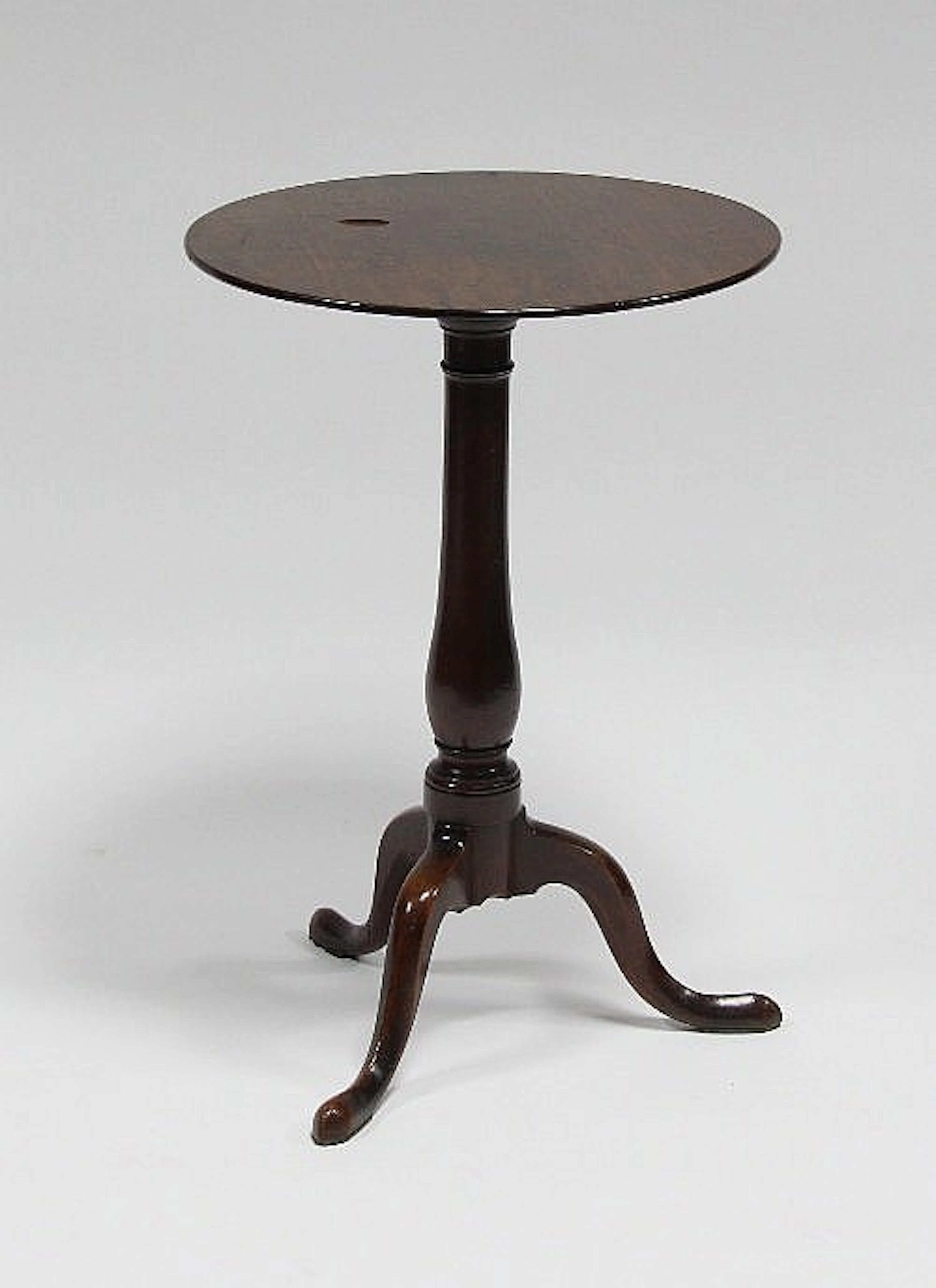 A George III tripod table with circular top, 48cm