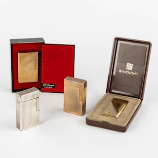 ST. Dupont, Three gold and silver plated lighters, added a Givency