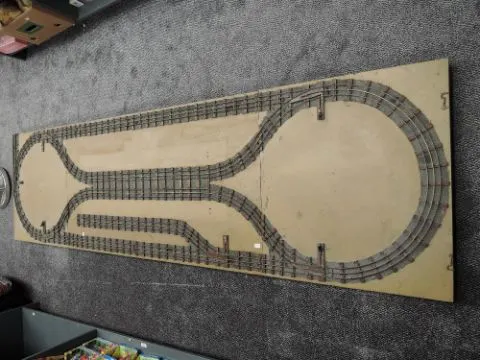 A 0 Gauge Three Rail Folding Layout on wooden folding trestle table ...
