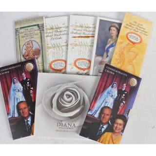 Commemorative coin sets, to include two 1989 uncirculated £2...