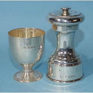 A silver pepper grinder of capstan form, with Peugeot Bros m...
