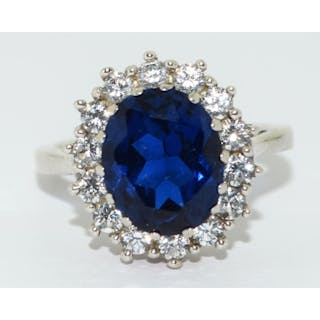 A large Princess Diana style 925 silver and CZ cluster ring ...