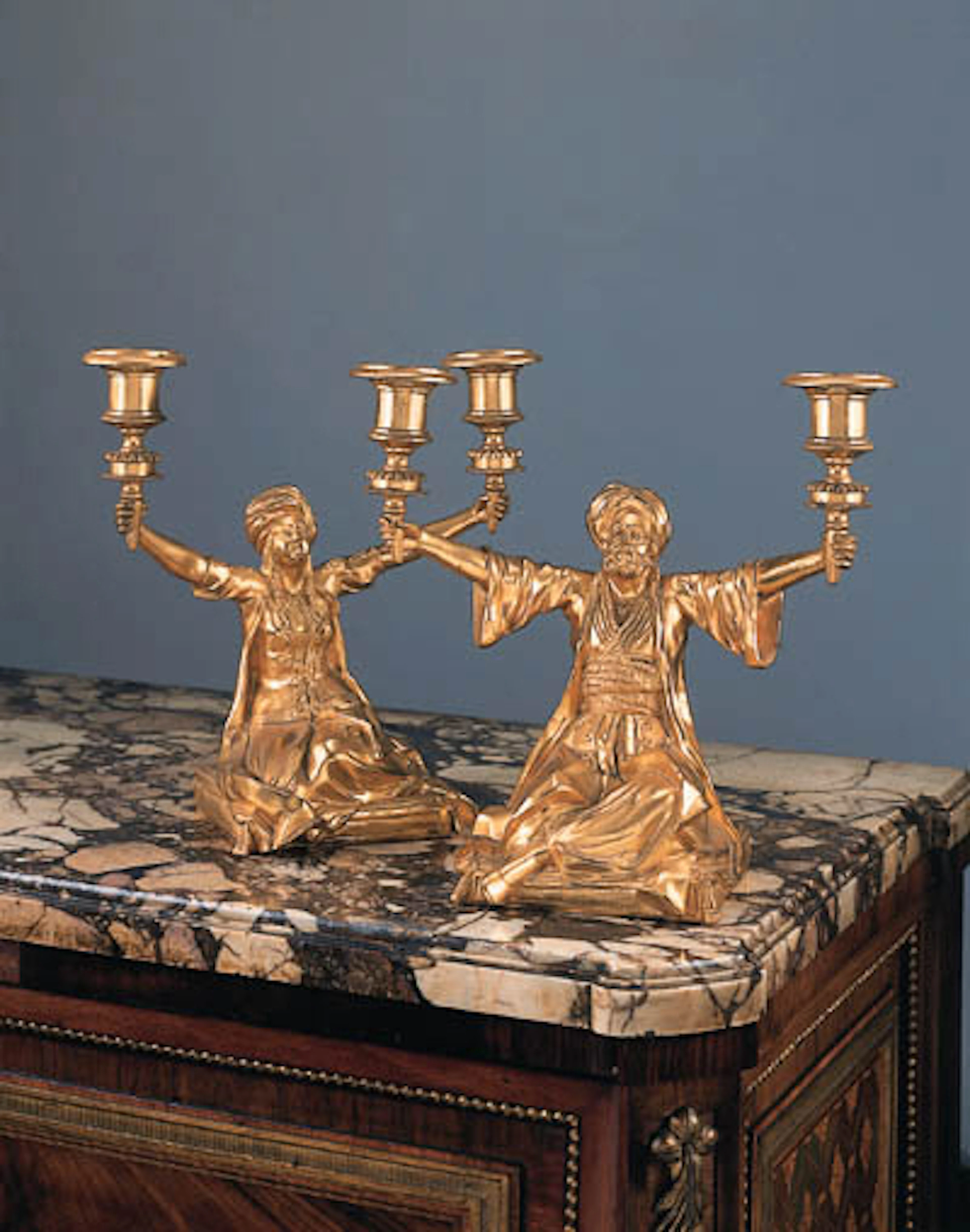 A pair of French bronze twin-light figural candelabra, late 19th century