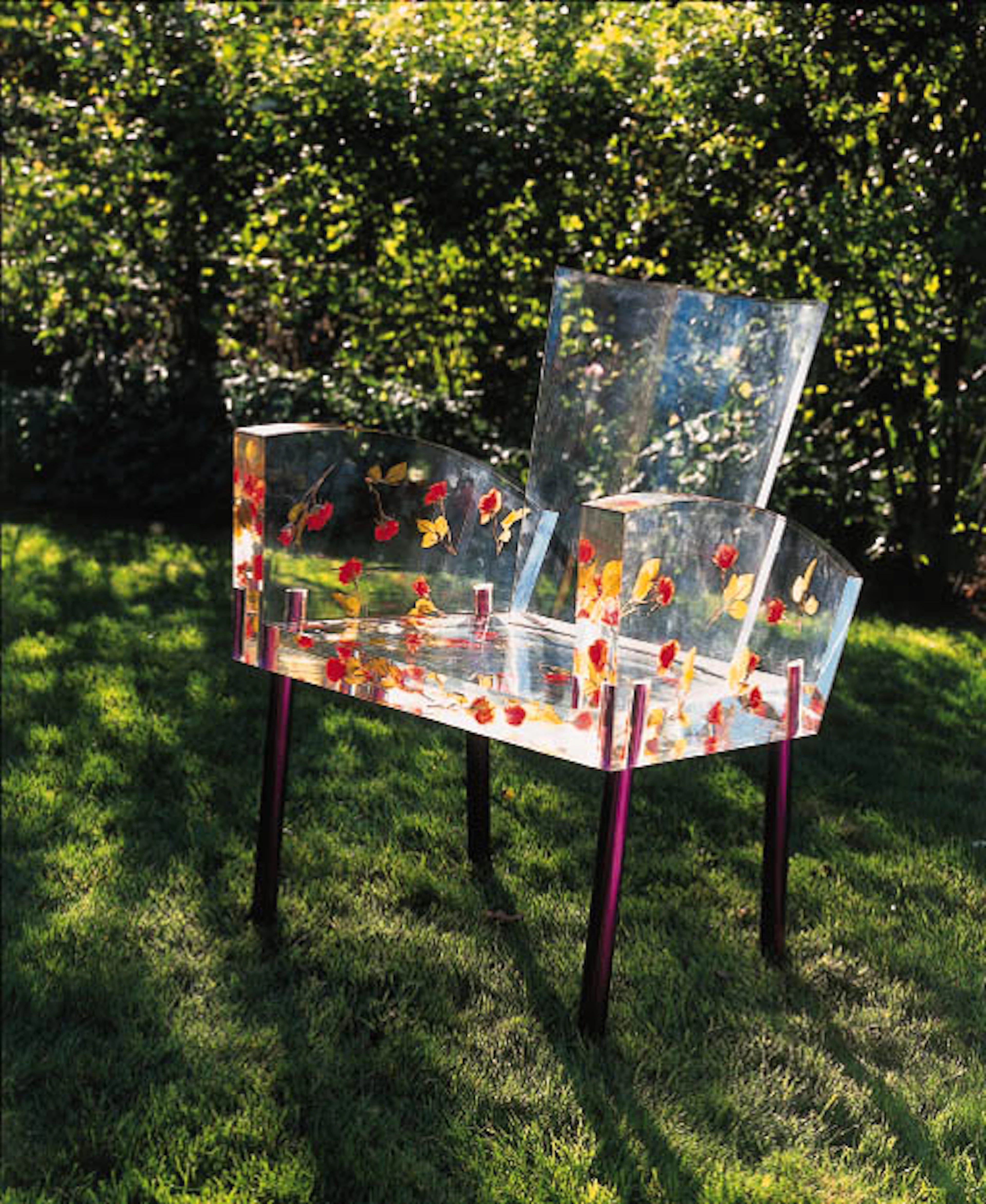 'MISS BLANCHE', AN ACRYLIC AND EPOXY-COATED TUBULAR ALUMINUM CHAIR WITH ARTIFICIAL ROSES
