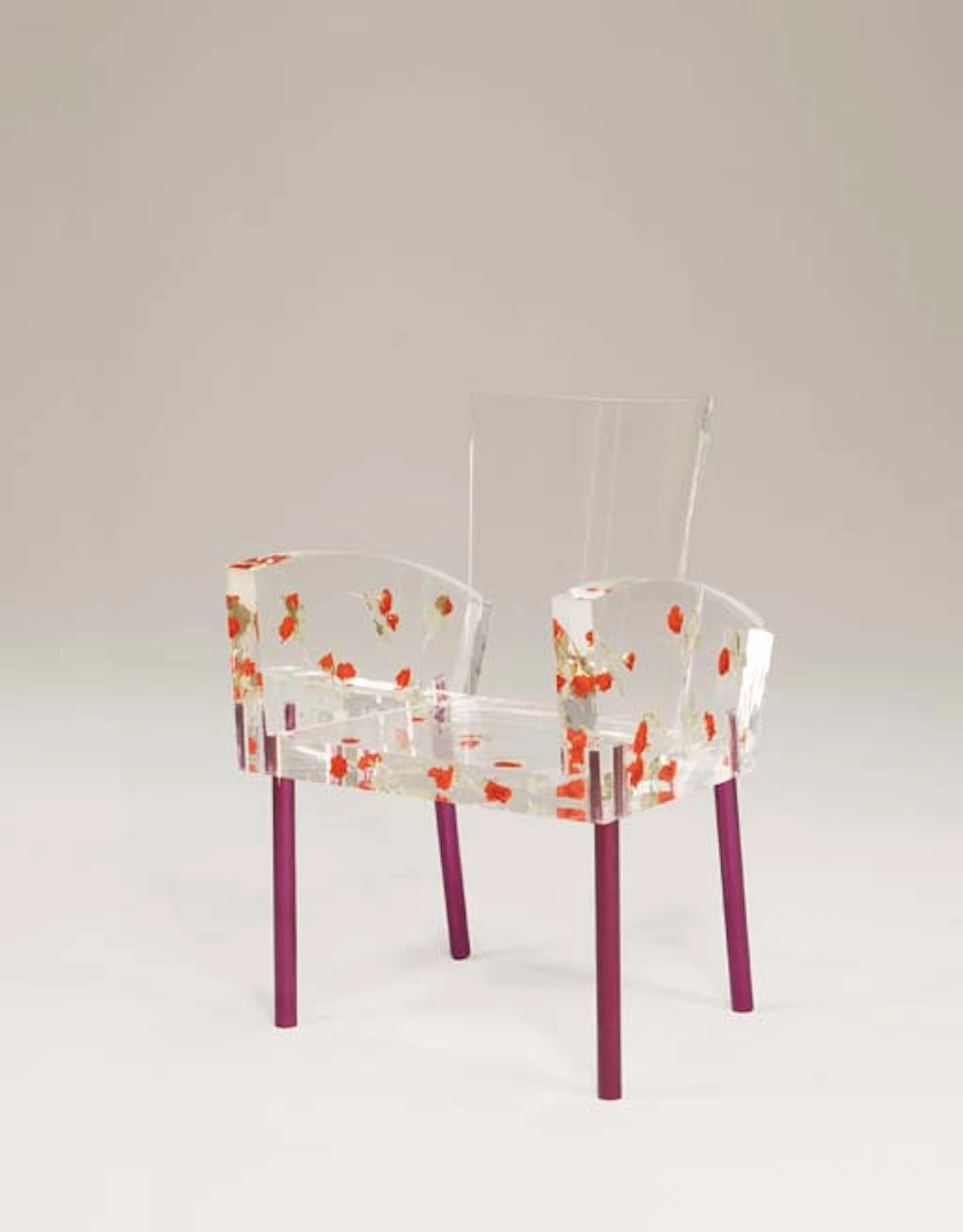 'MISS BLANCHE,' AN ACRYLIC AND EPOXY-COATED TUBULAR ALUMINUM CHAIR WITH ARTIFICAL ROSES