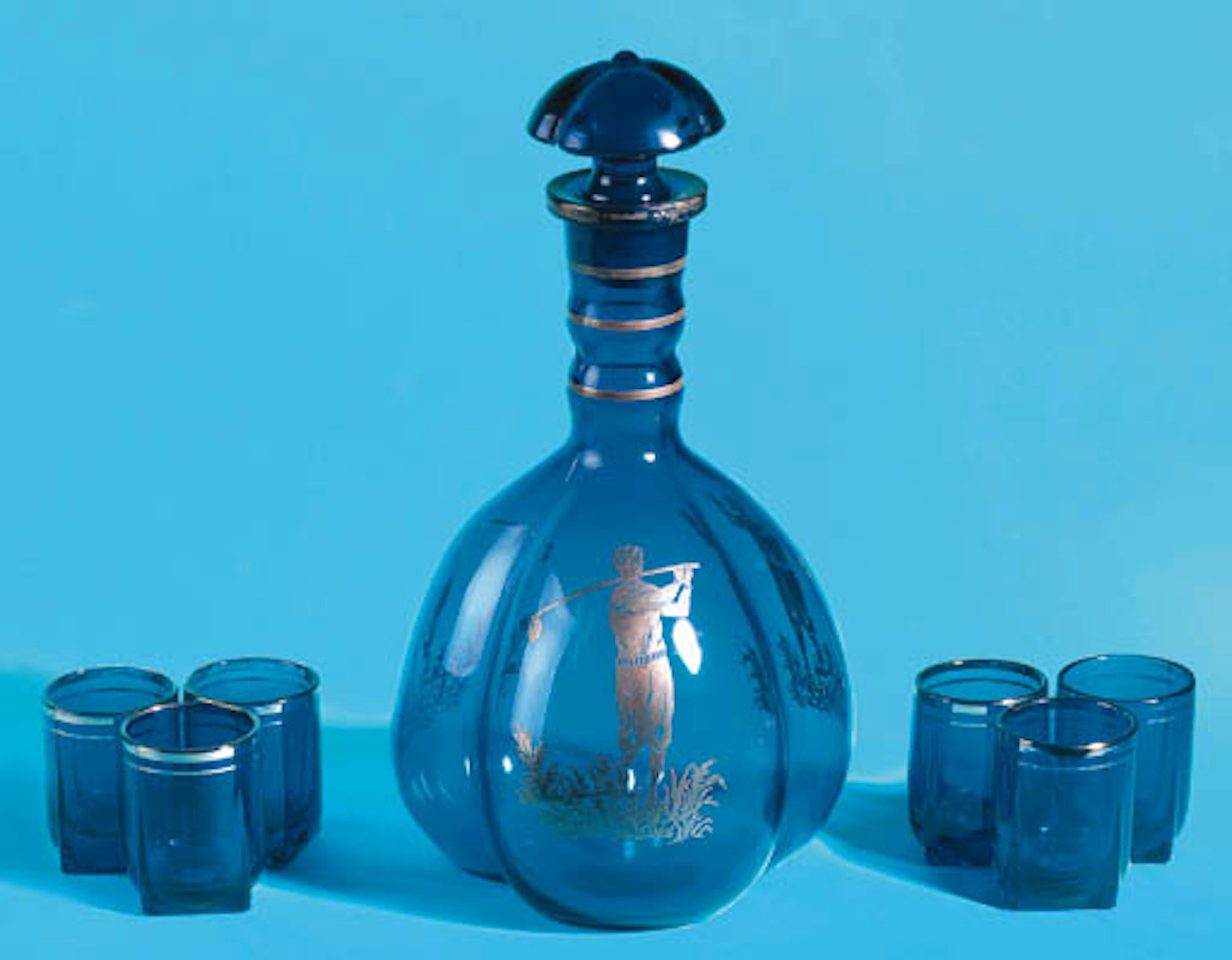 A COBALT BLUE GLASS DECANTER AND STOPPER