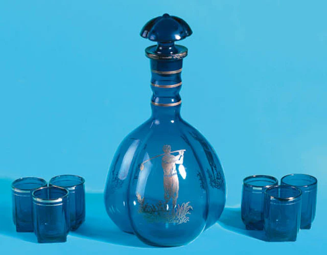A COBALT BLUE GLASS DECANTER AND STOPPER