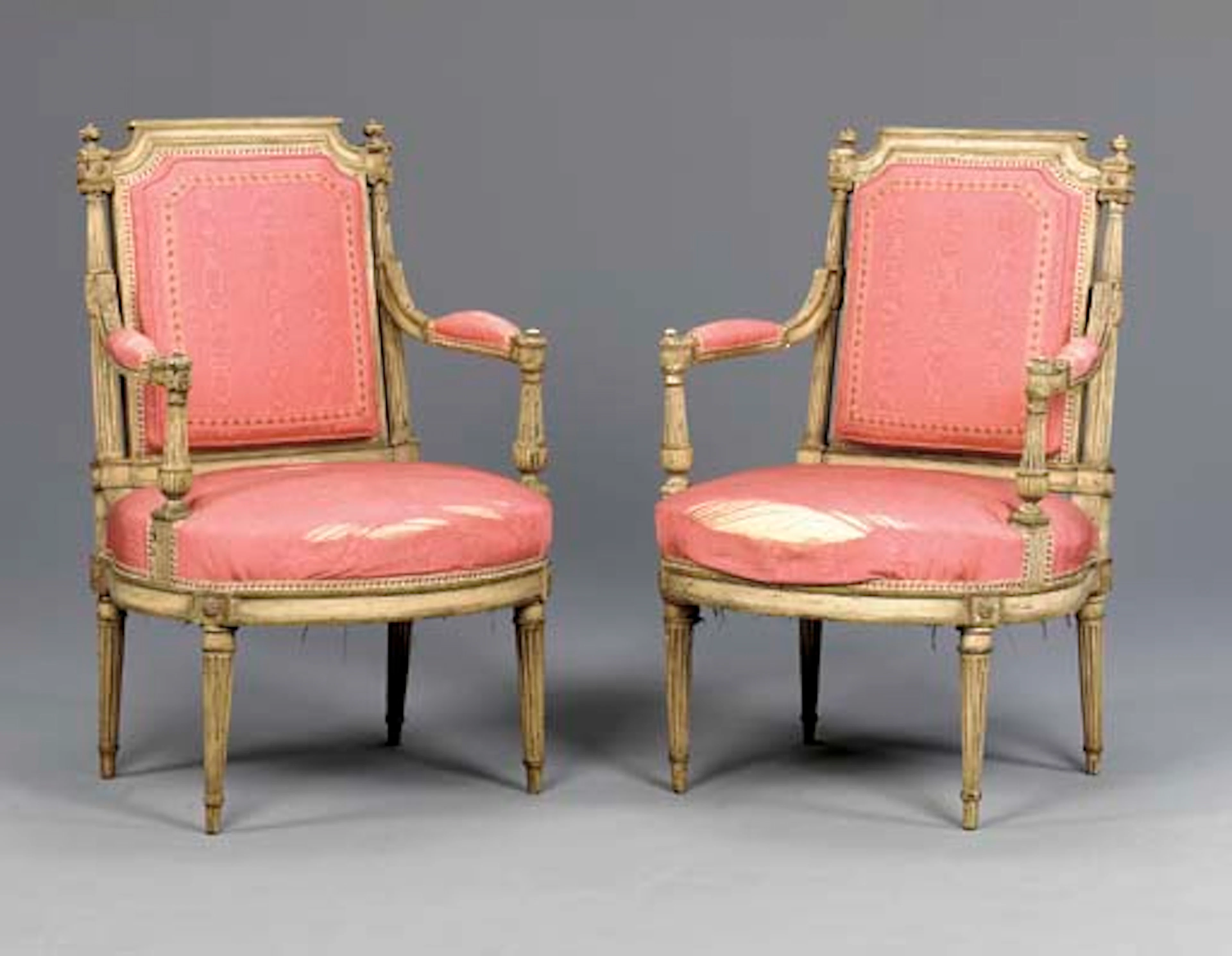 A PAIR OF LOUIS XVI GREY-PAINTED FAUTEUILS A LA REINE