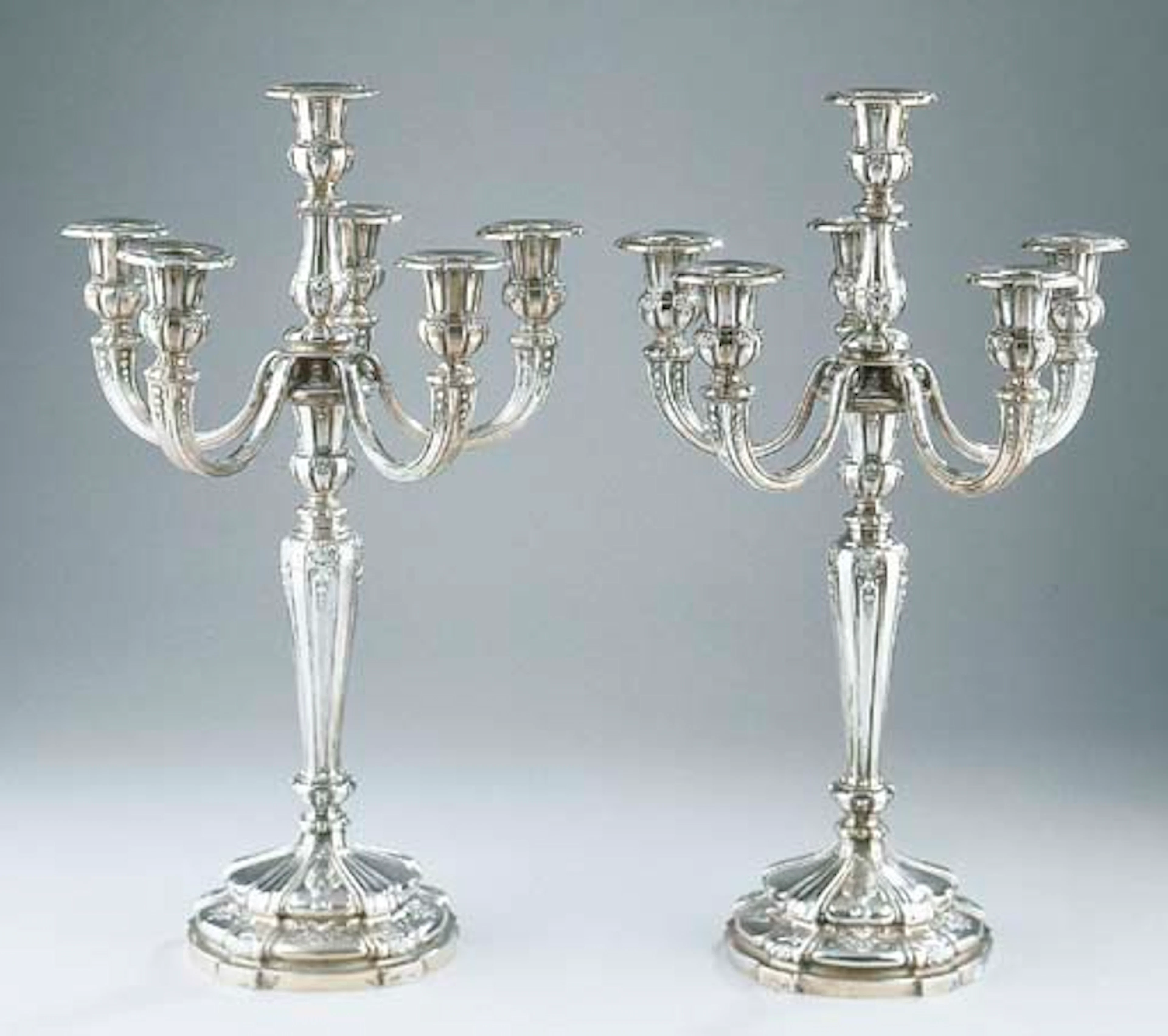 A pair of Belgian silver six-light candelabra