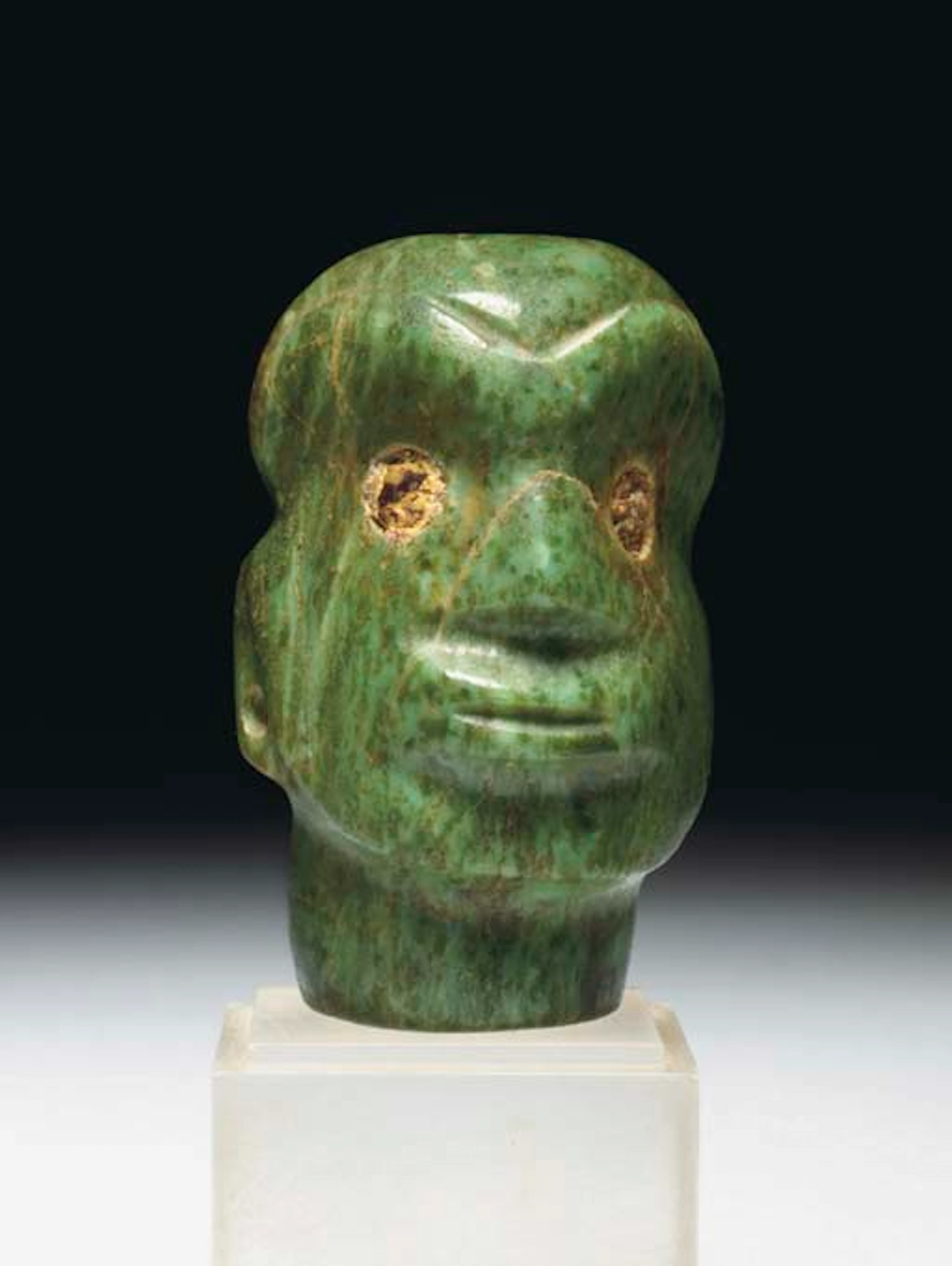 A MAYAN JADE HEAD PENDANT