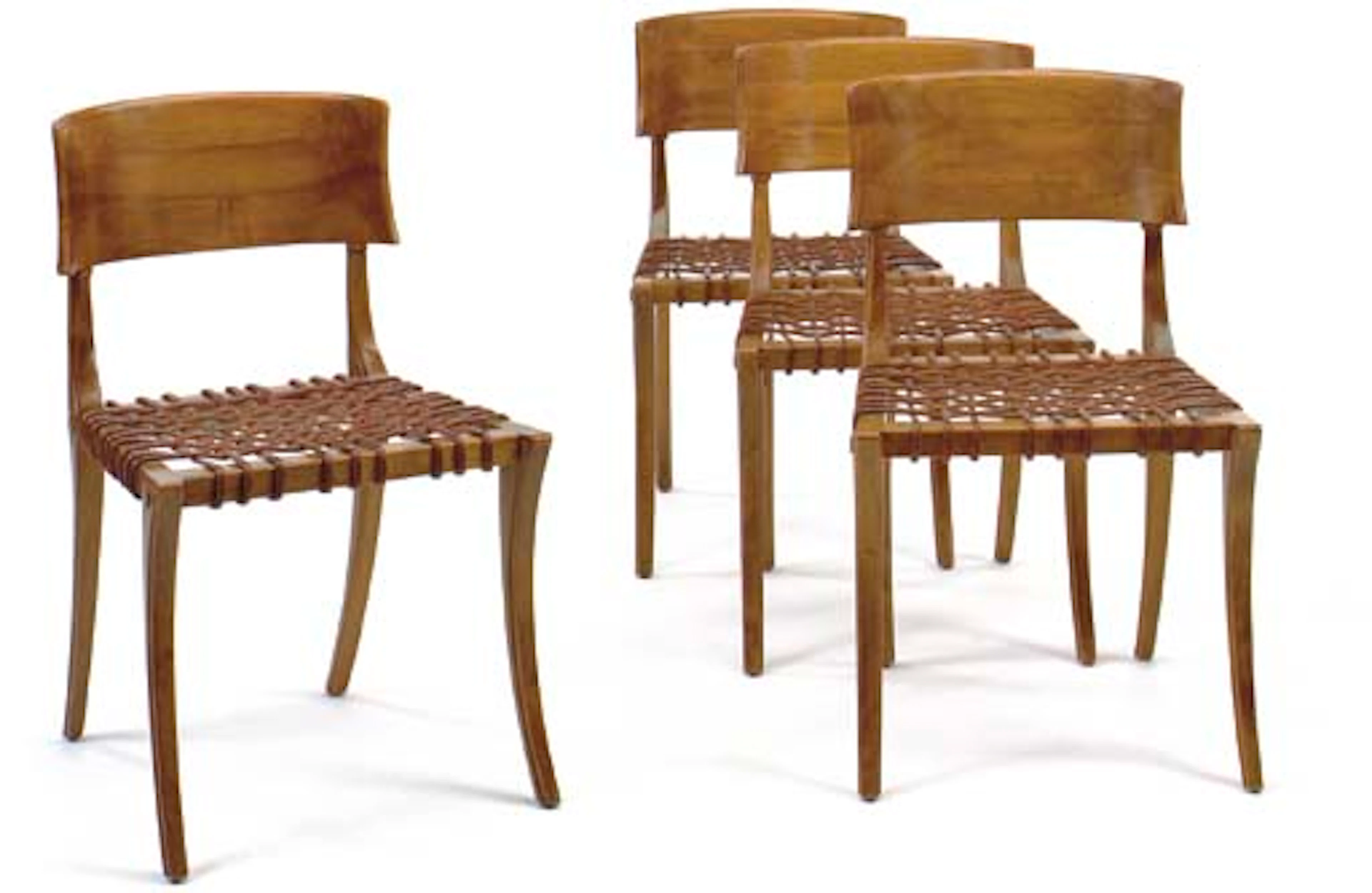 A SET OF FOUR WALNUT AND LEATHER 'KLISMOS' CHAIRS, DESIGNED 1961
