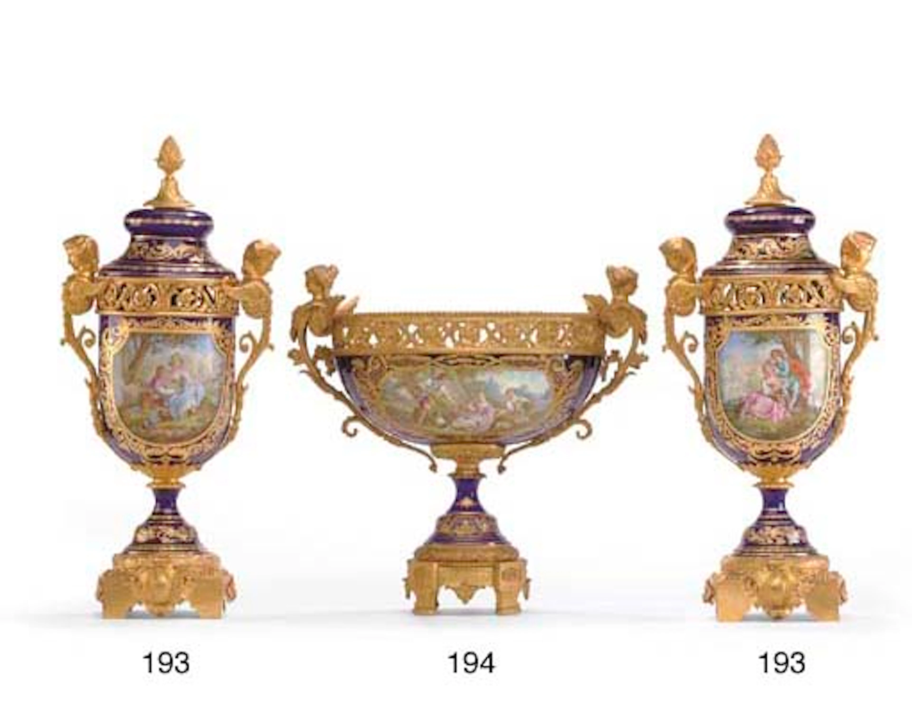 AN ORMOLU-MOUNTED SEVRES STYLE COBALT-BLUE GROUND CENTERPIECE