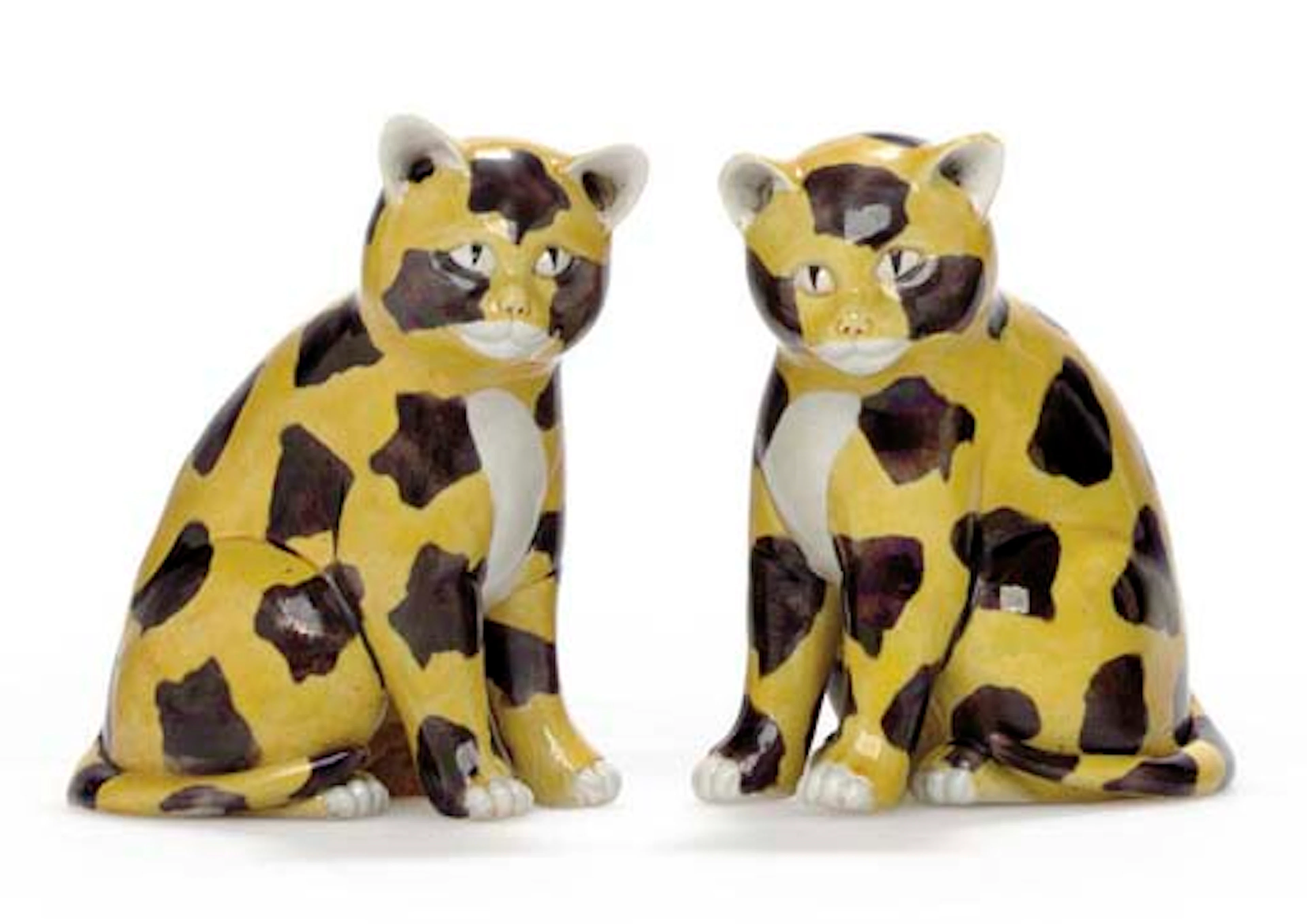 A PAIR OF BISCUIT-GLAZED CATS