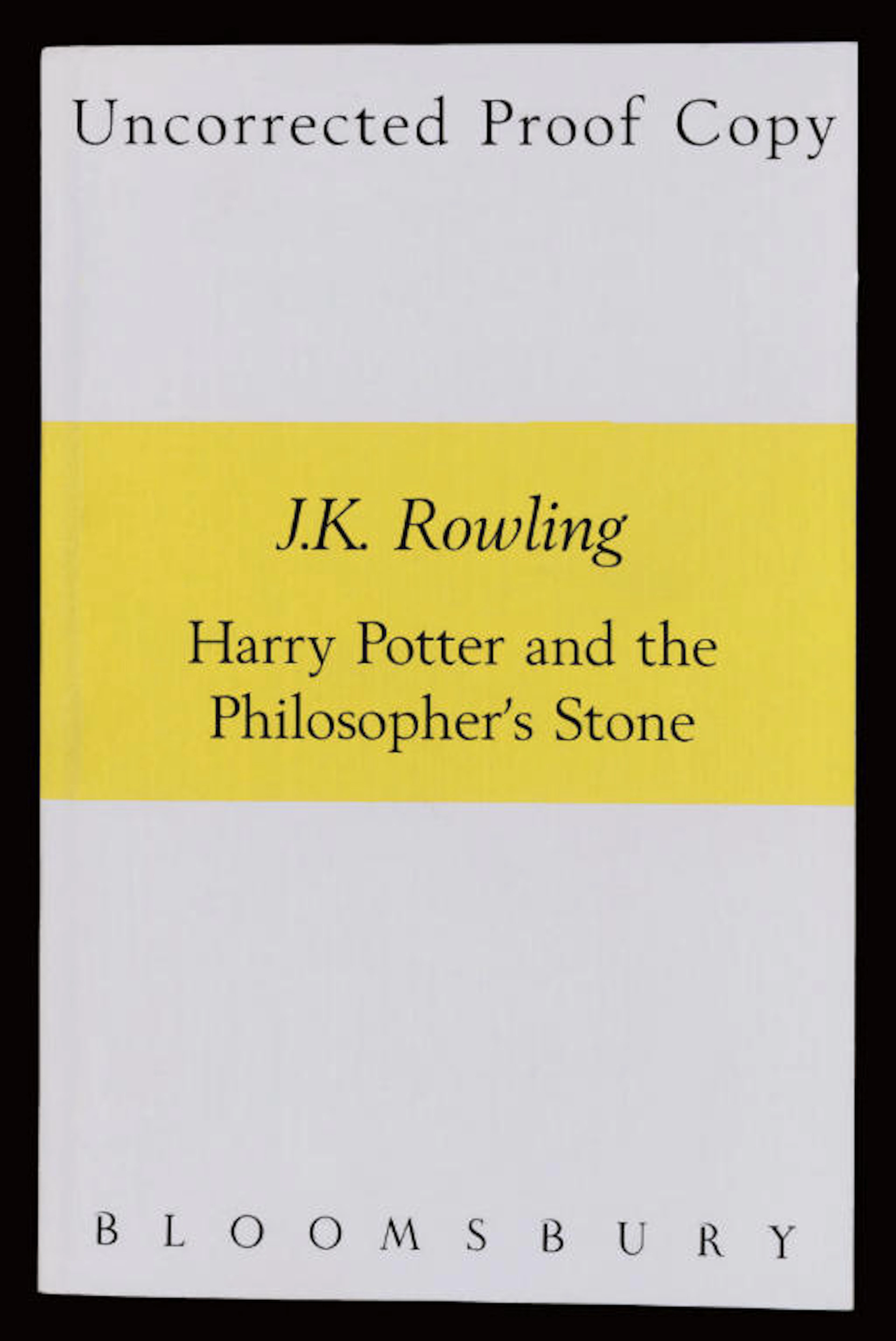 ROWLING, J. K. Harry Potter and the Philosopher's Stone. London: Bloomsbury, 1997. 8°. Half title. Original white wrappers lettered in black with central yellow band.