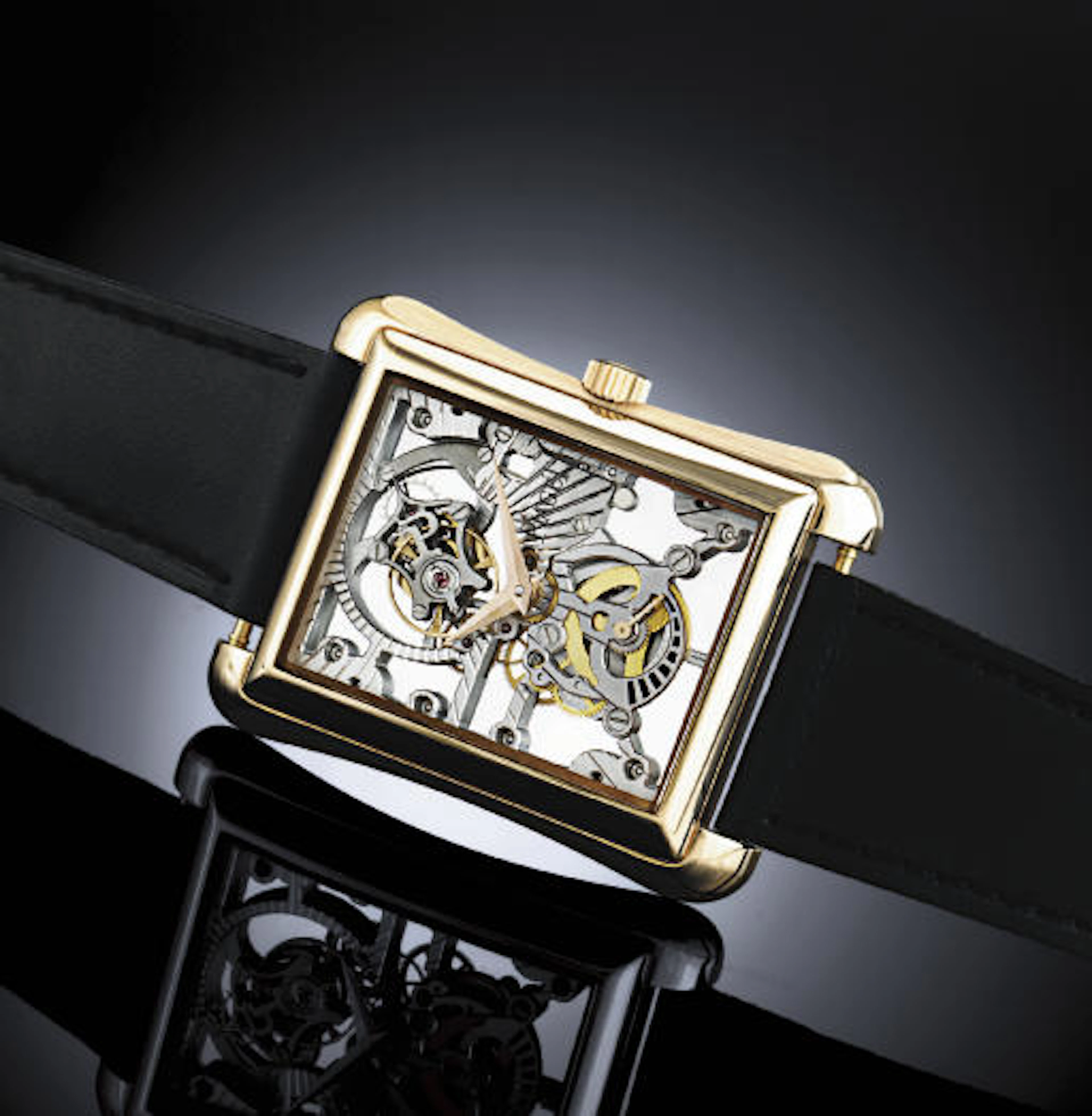 Piaget. A Fine and Rare 18k Pink Gold Rectangular Skeletonized Tourbillon Rectangular Wristwatch With Power Reserve