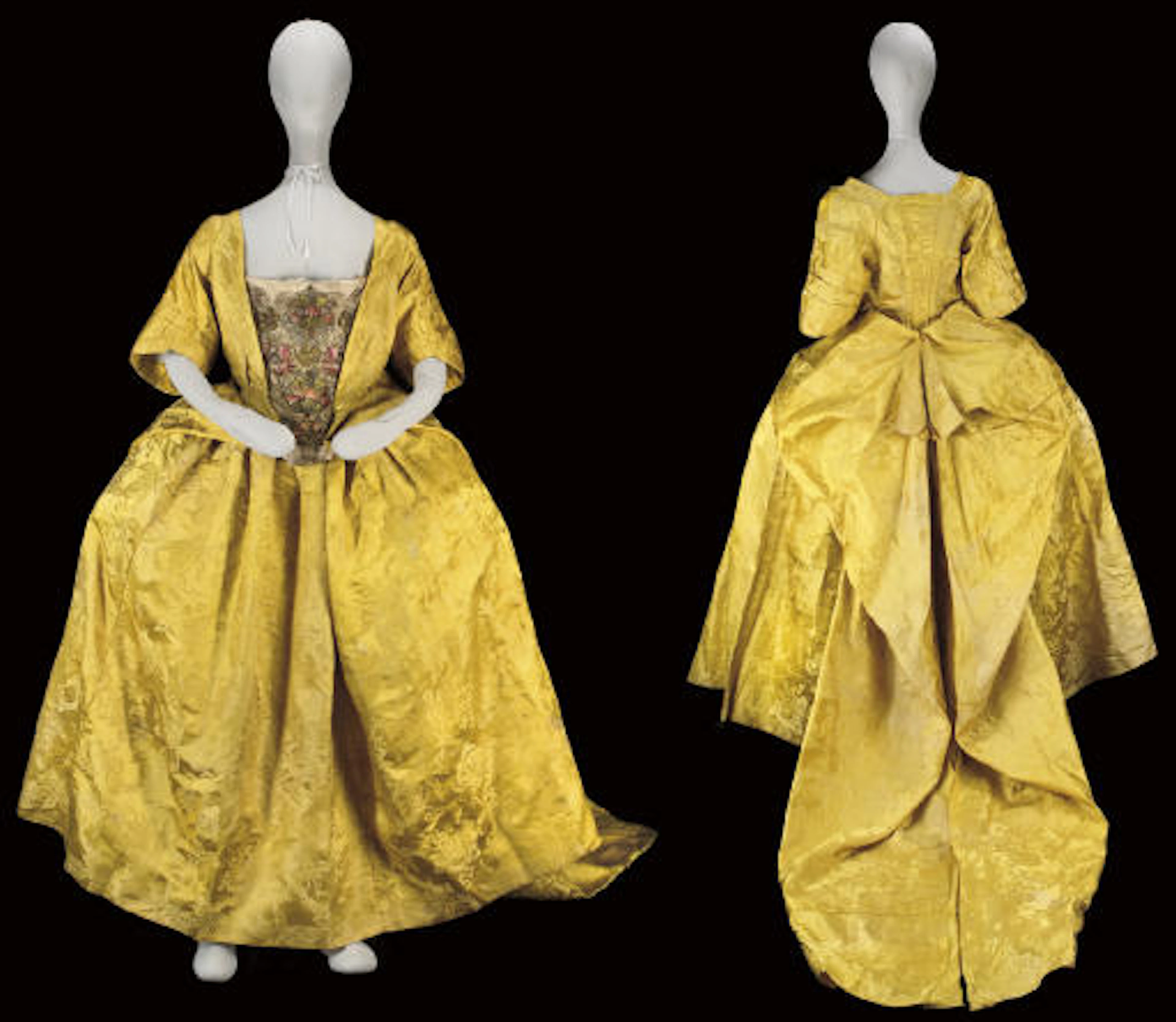 A COURT MANTUA OF CHINESE IMPERIAL YELLOW SILK DAMASK, THE SILK CIRCA 1740, THE MANTUA 1750S