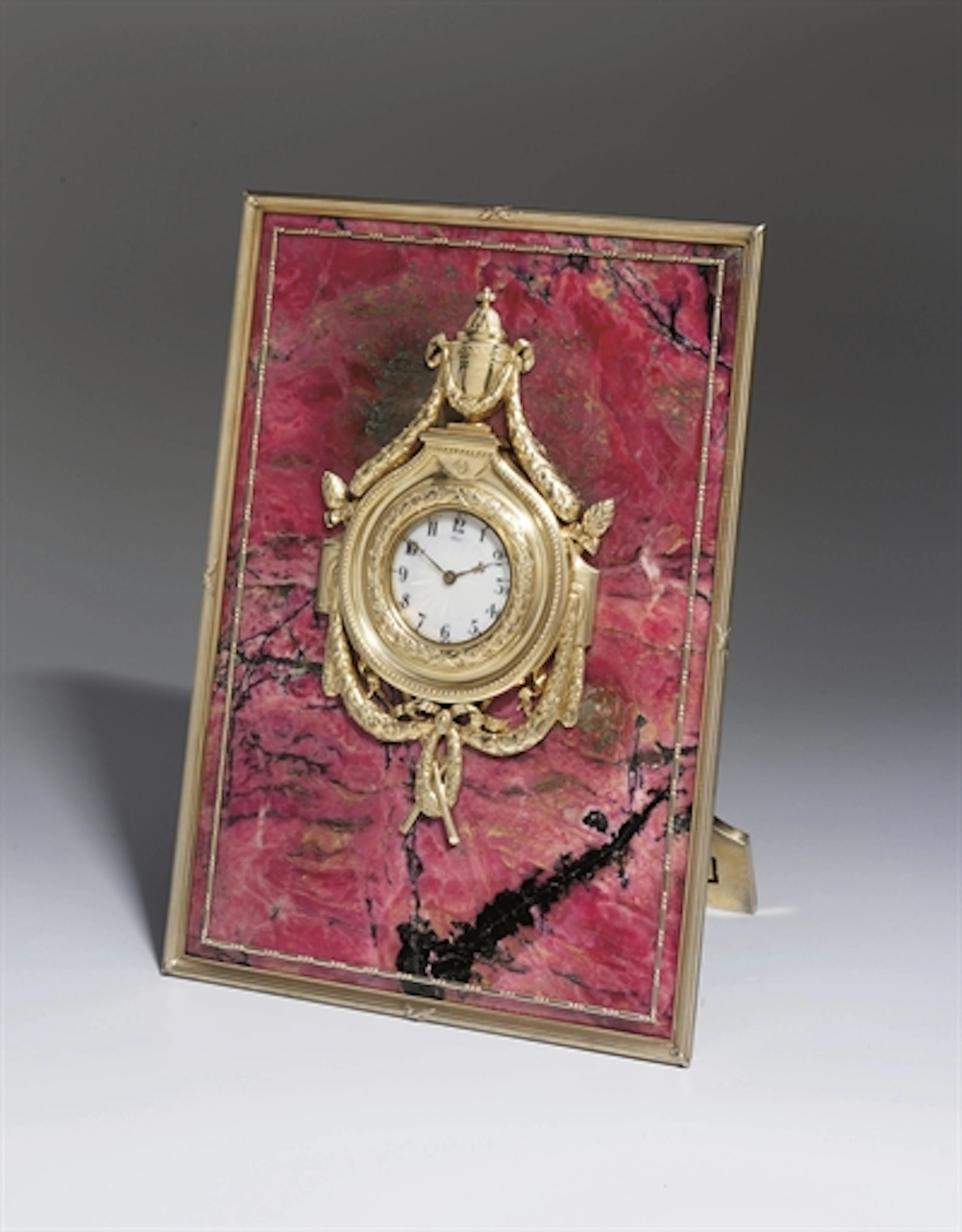 A Large Silver-Gilt and Rhodonite Clock