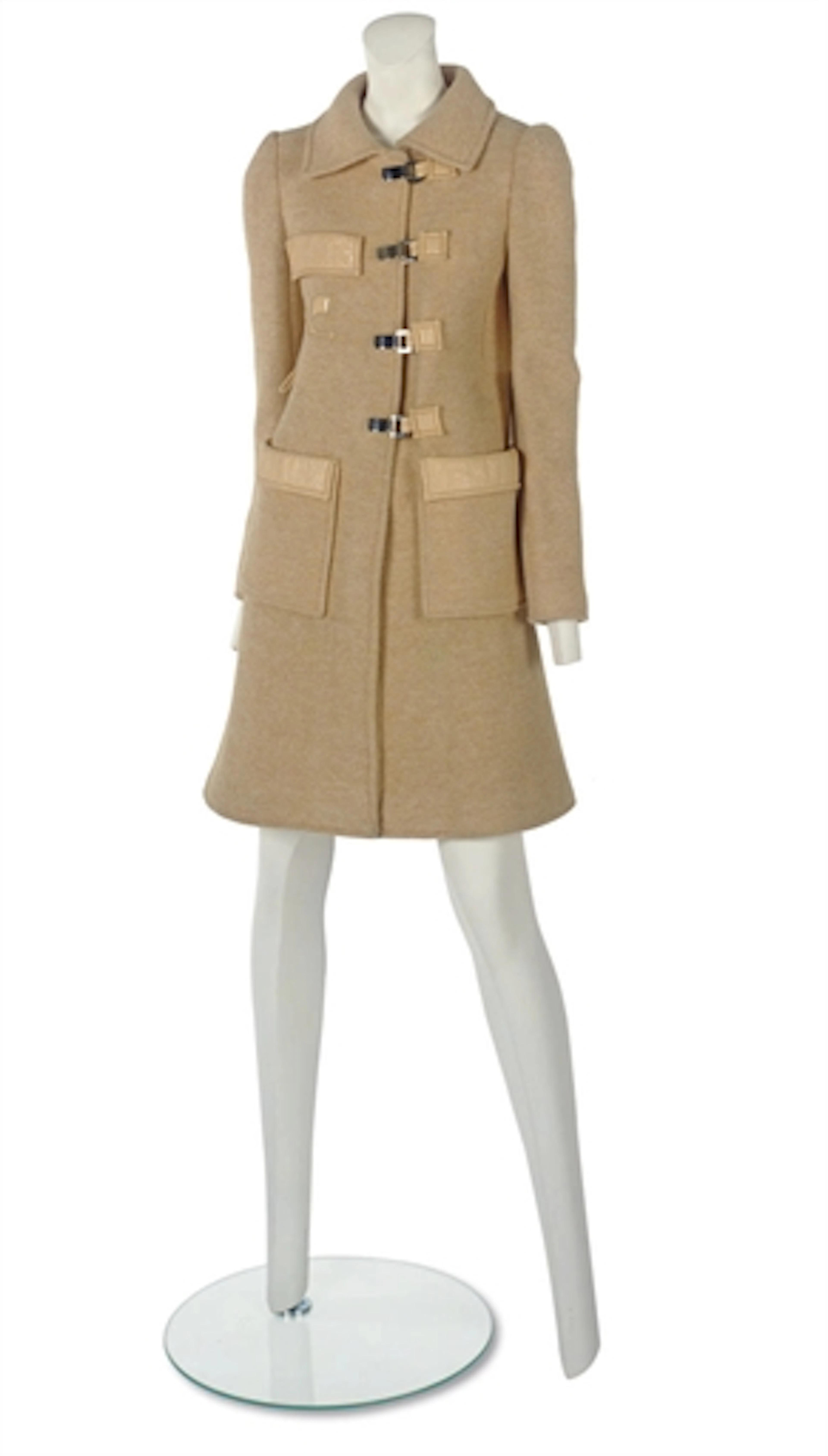 ANDRÉ COURRÈGES (B.1923) A KNITTED COAT OF APRICOT WOOL