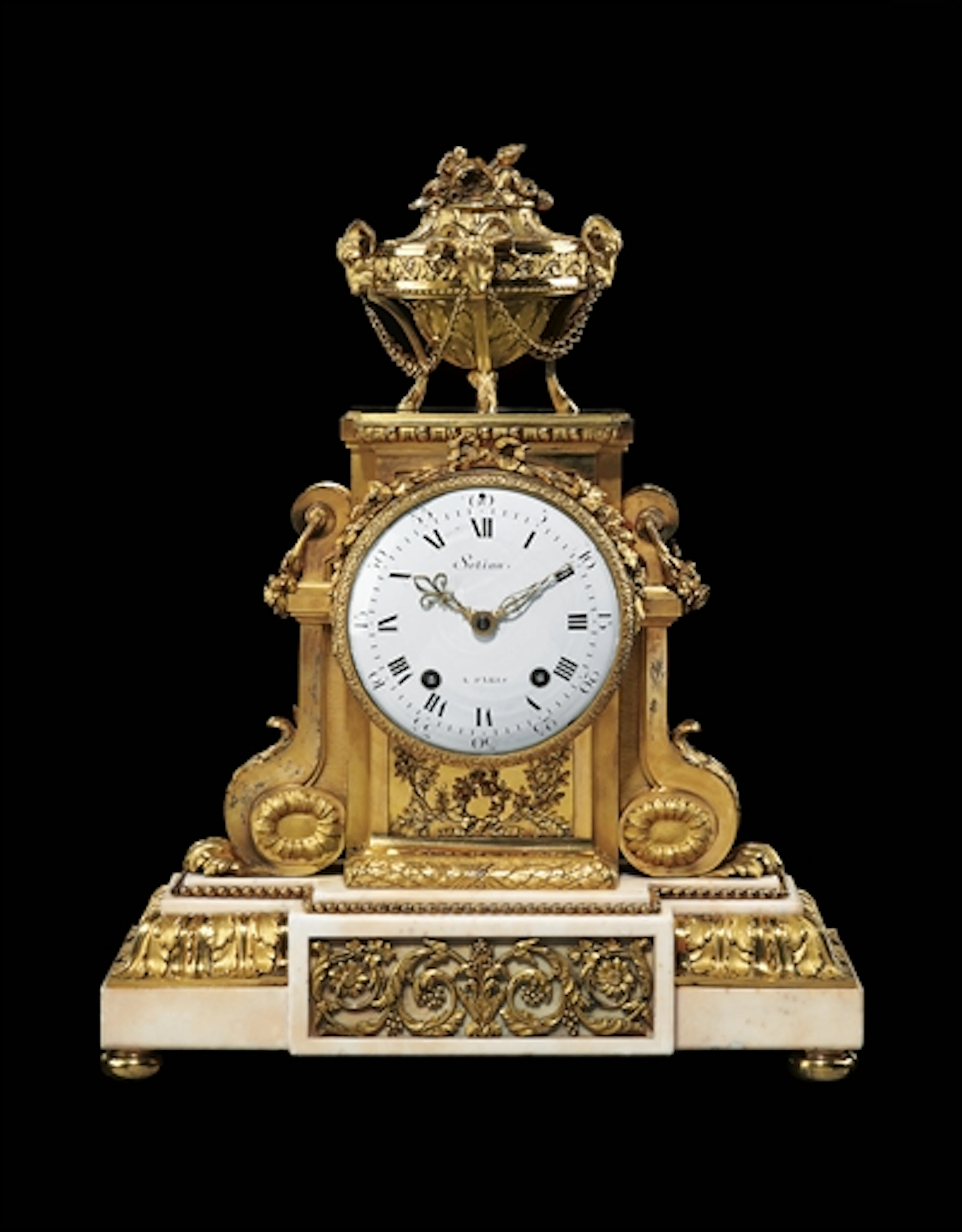 A LOUIS XVI ORMOLU AND WHITE MARBLE MANTEL CLOCK