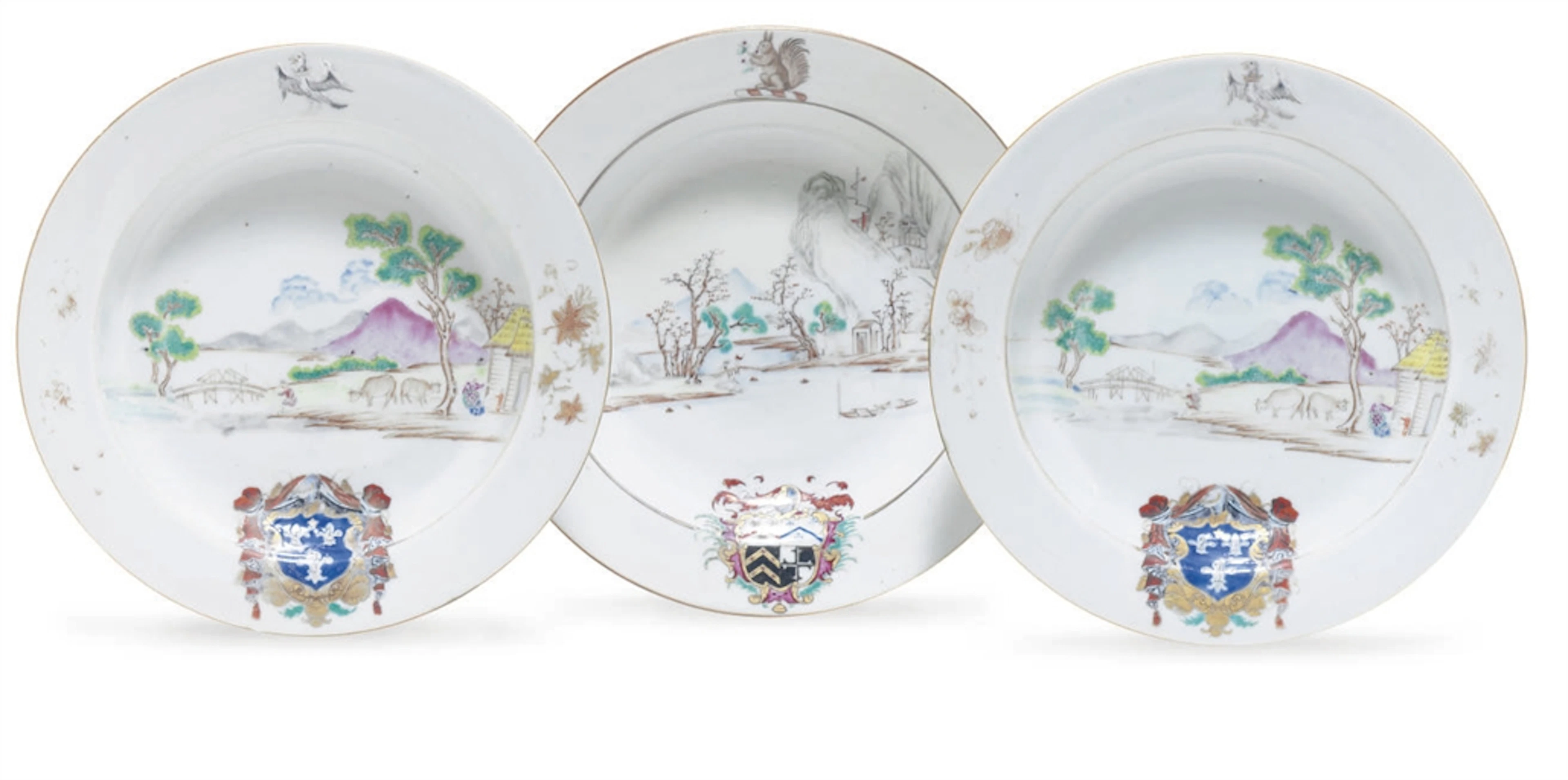 THREE CHINESE EXPORT ARMORIAL PORCELAIN SOUP PLATES