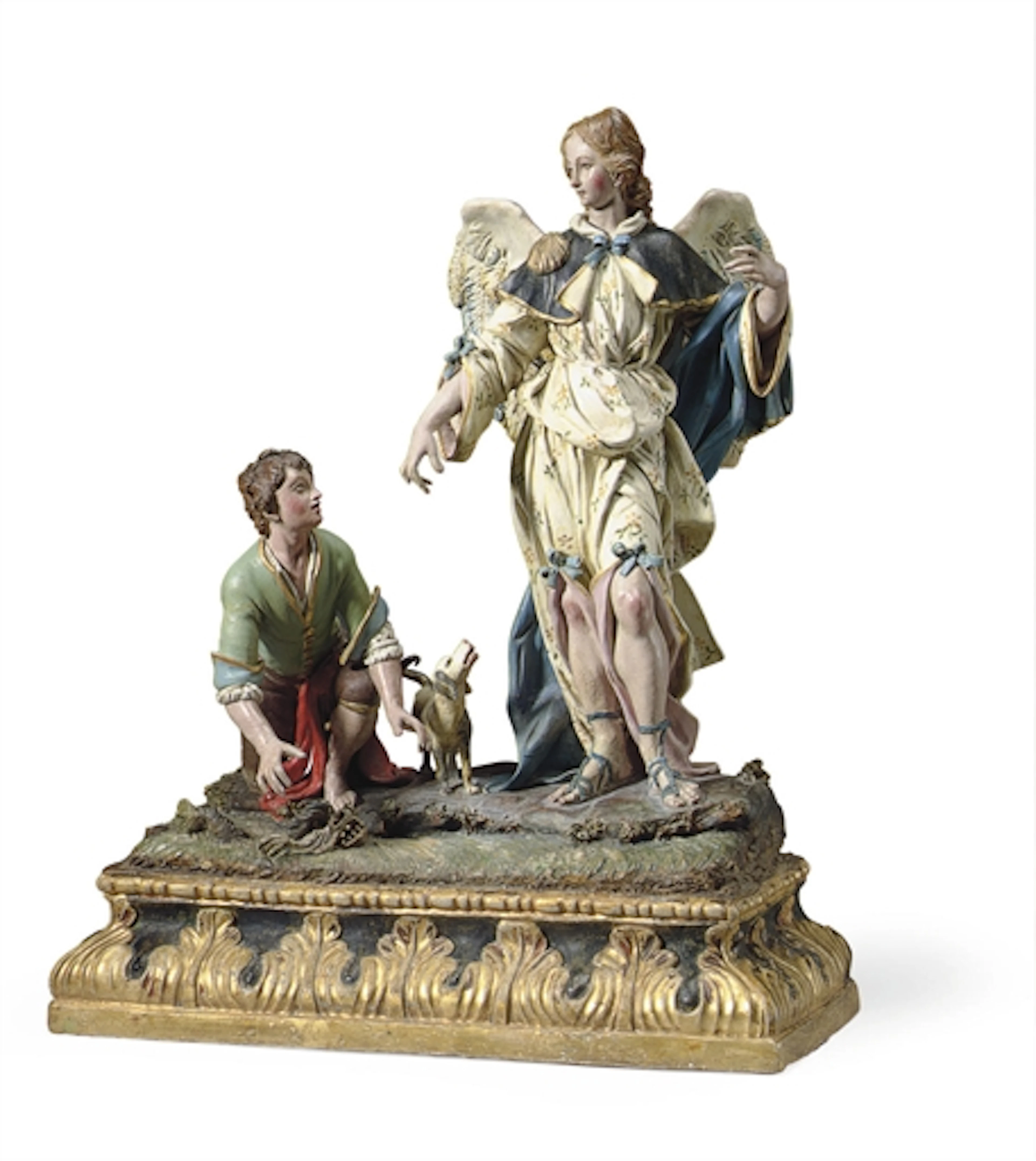A POLYCHROME-DECORATED TERRACOTTA GROUP OF TOBIAS AND THE ANGEL