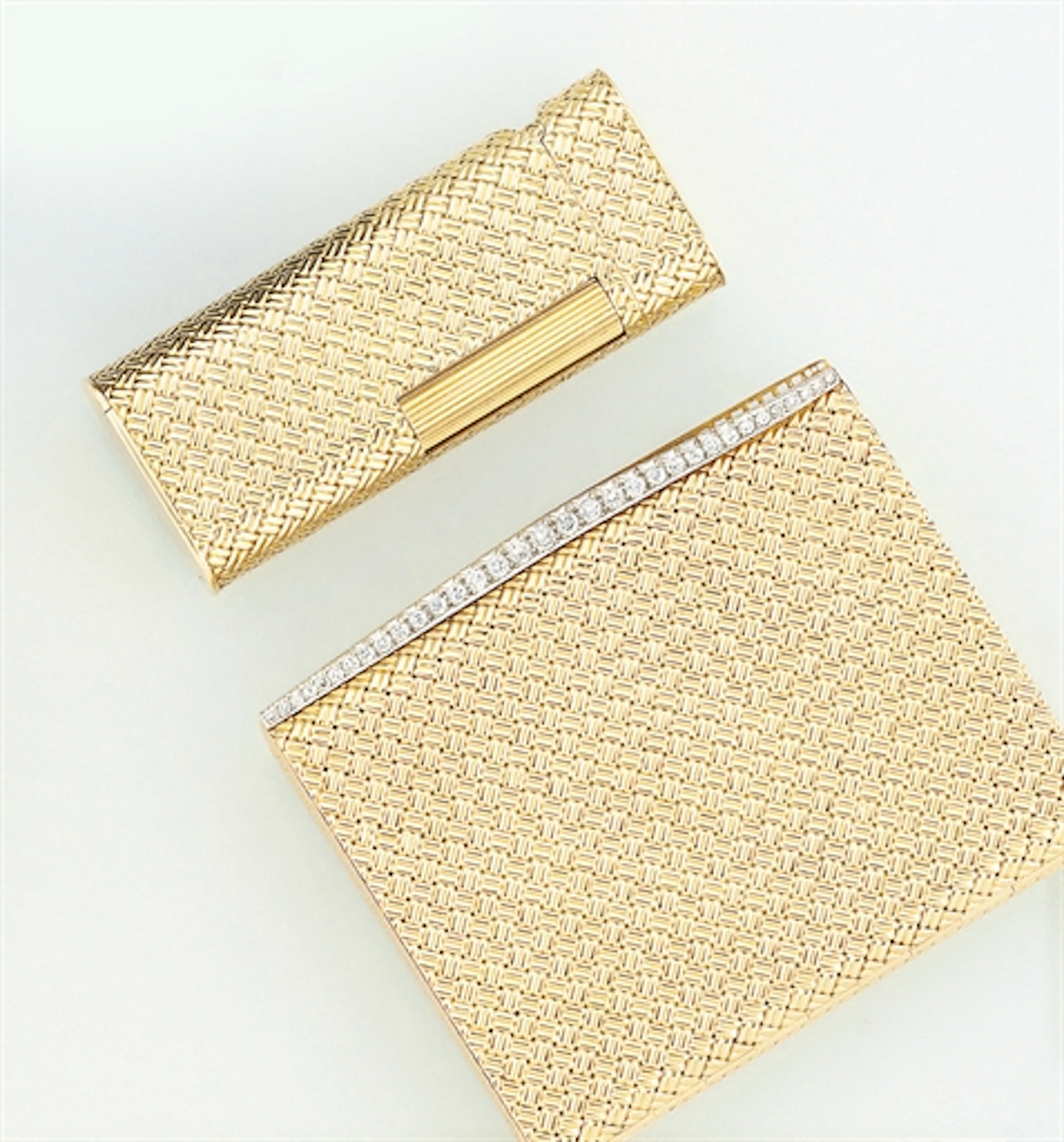 A compact, photograph frame, by Van Cleef & Arpels and a gas lighter