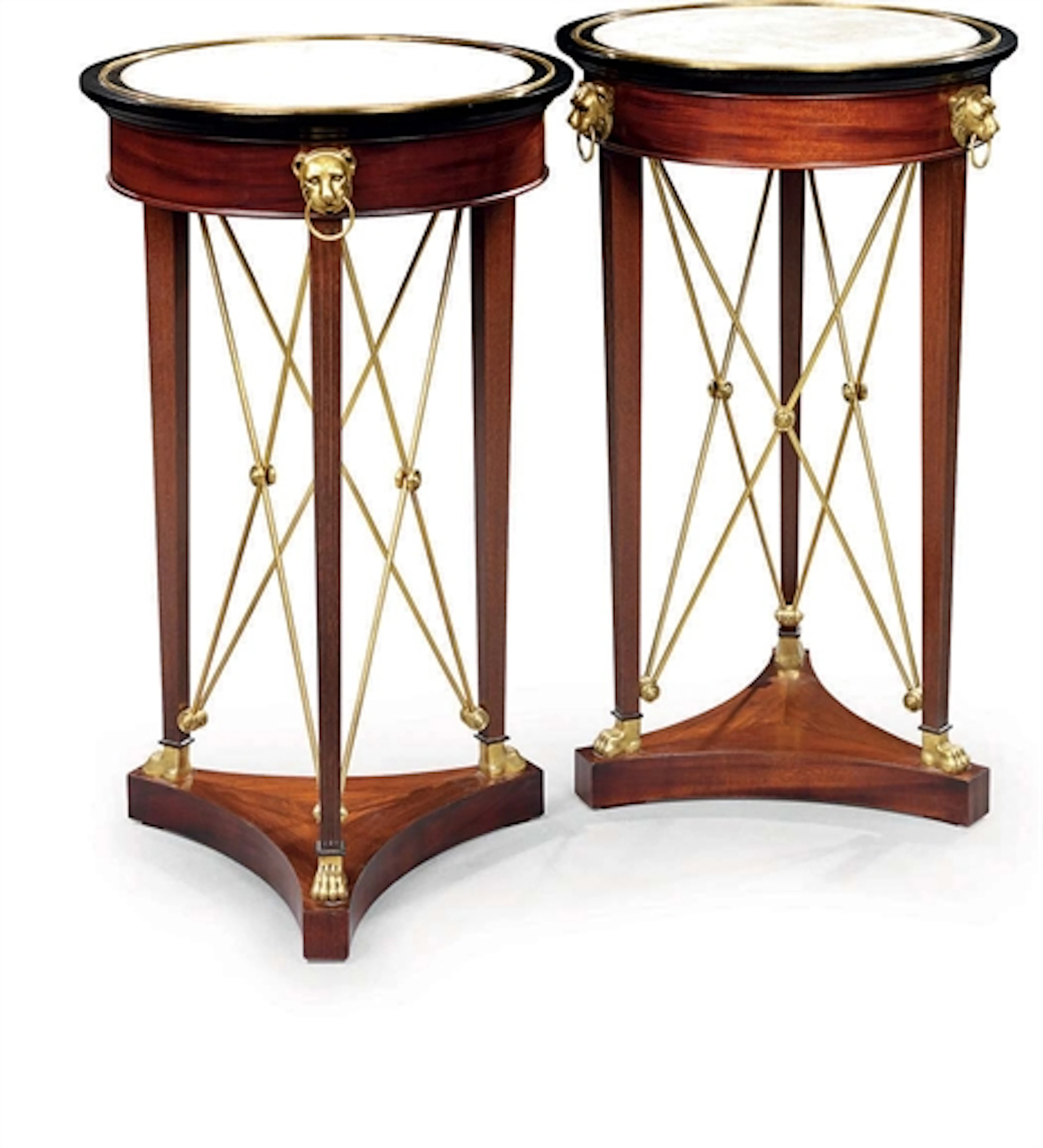A PAIR OF FRENCH GILT-METAL, MAHOGANY AND EBONISED GUERIDONS