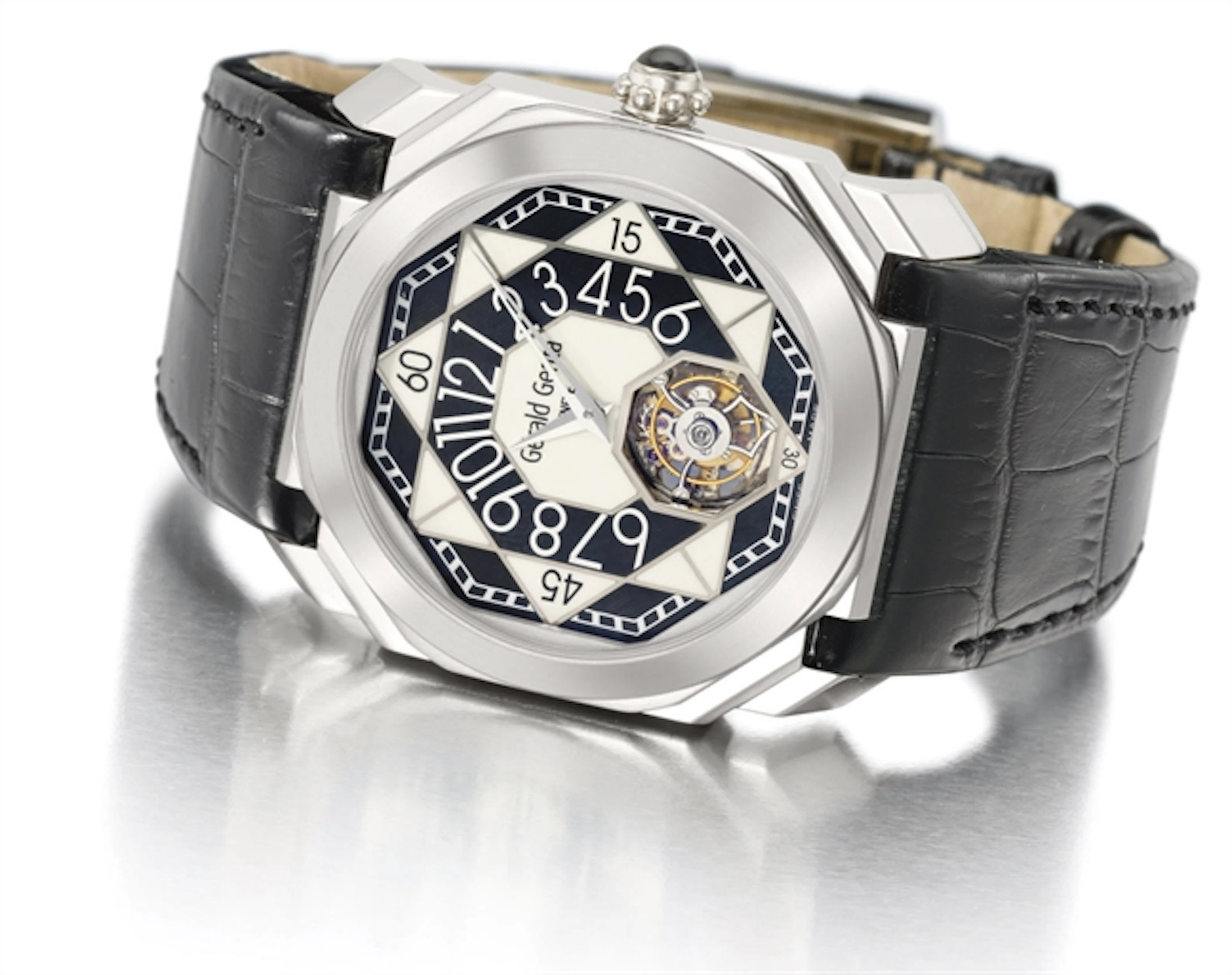 Gerald Genta. A rare and large platinum and tantalum octagonal automatic tourbillon wristwatch with retrograde hours and ceramic dial