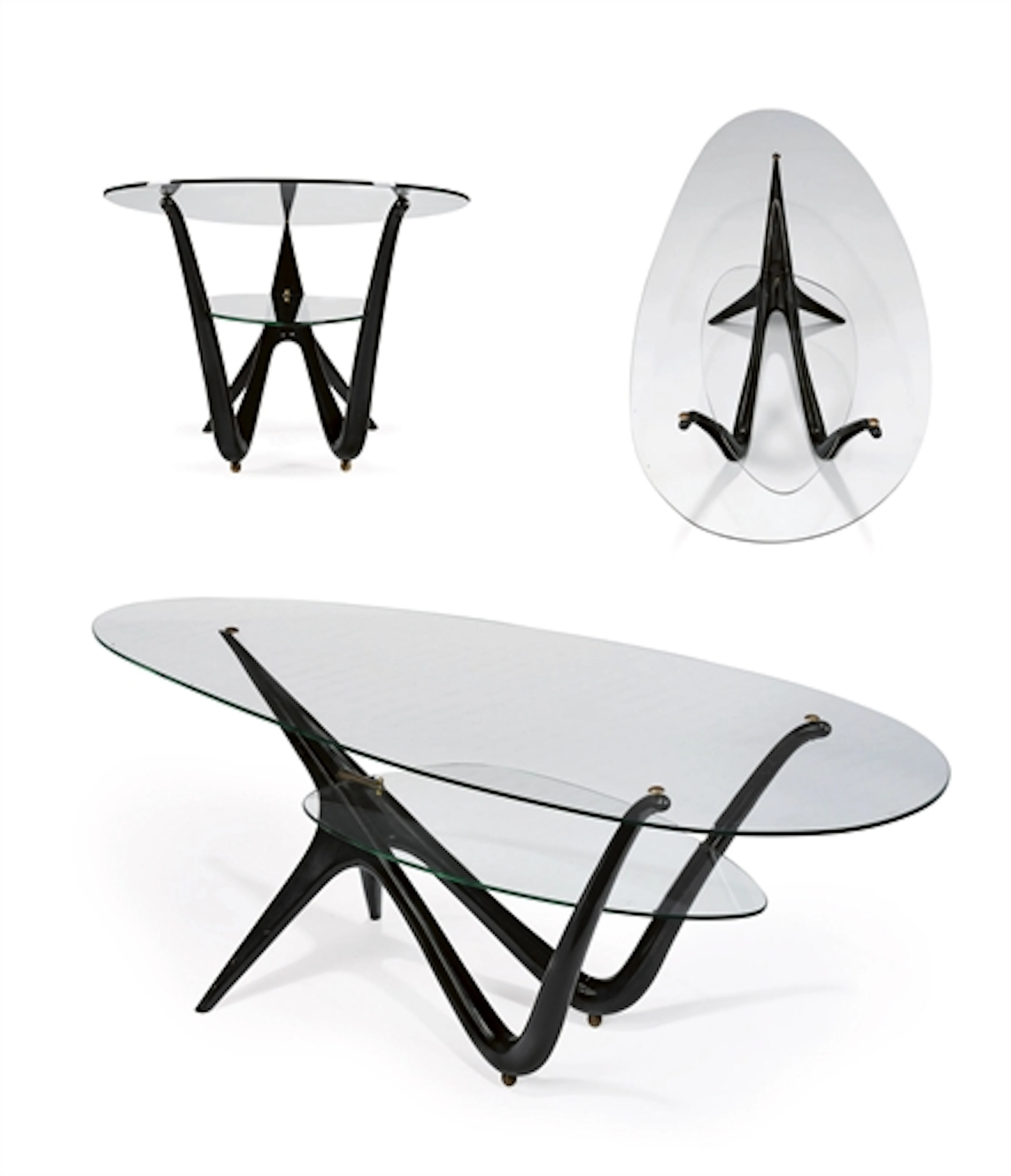 AN IMPORTANT EBONIZED WOOD AND GLASS OCCASSIONAL TABLE, CIRCA 1949-1950