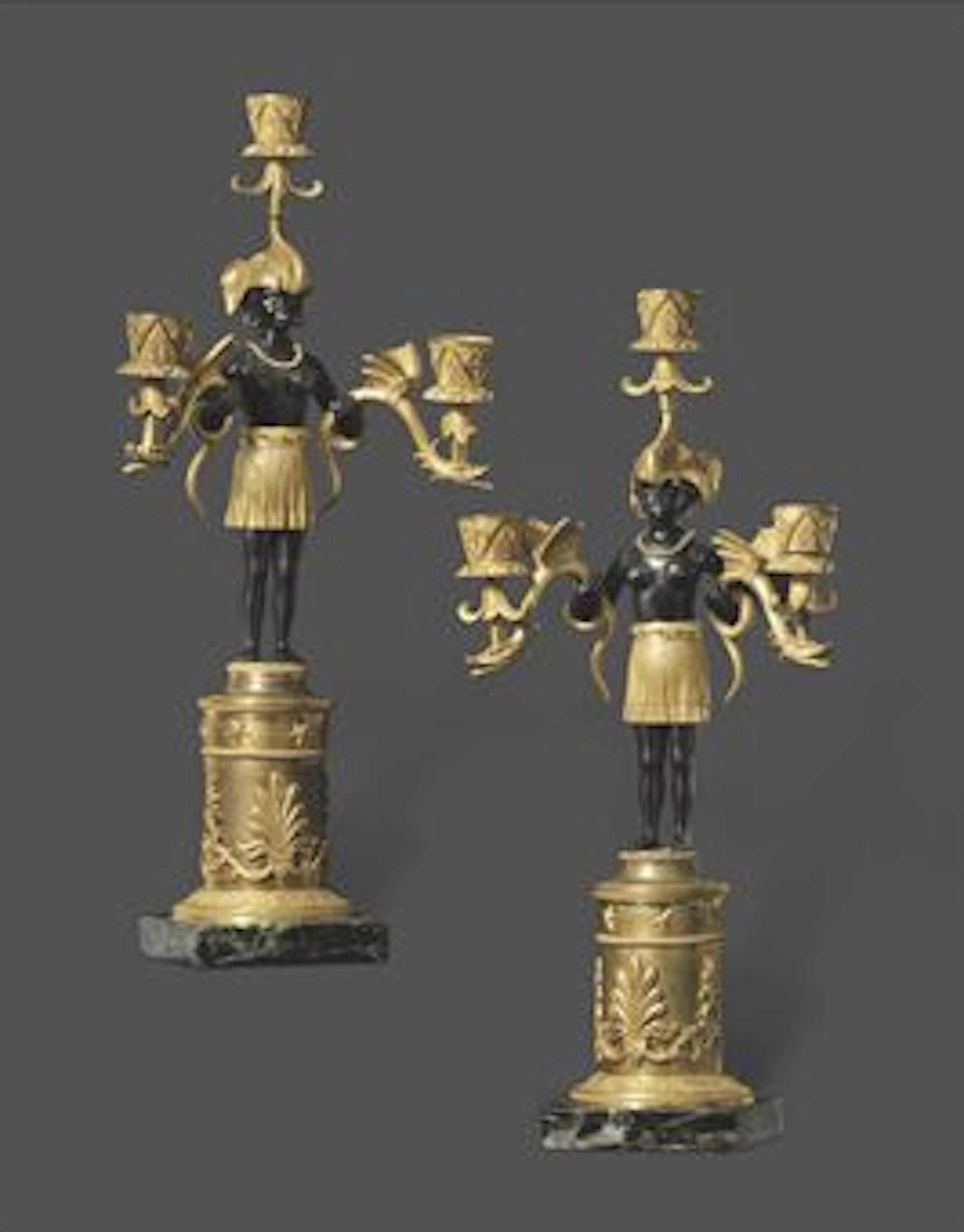 A PAIR OF DIRECTOIRE ORMOLU AND PATINATED BRONZE THREE-BRANCH CANDELABRA