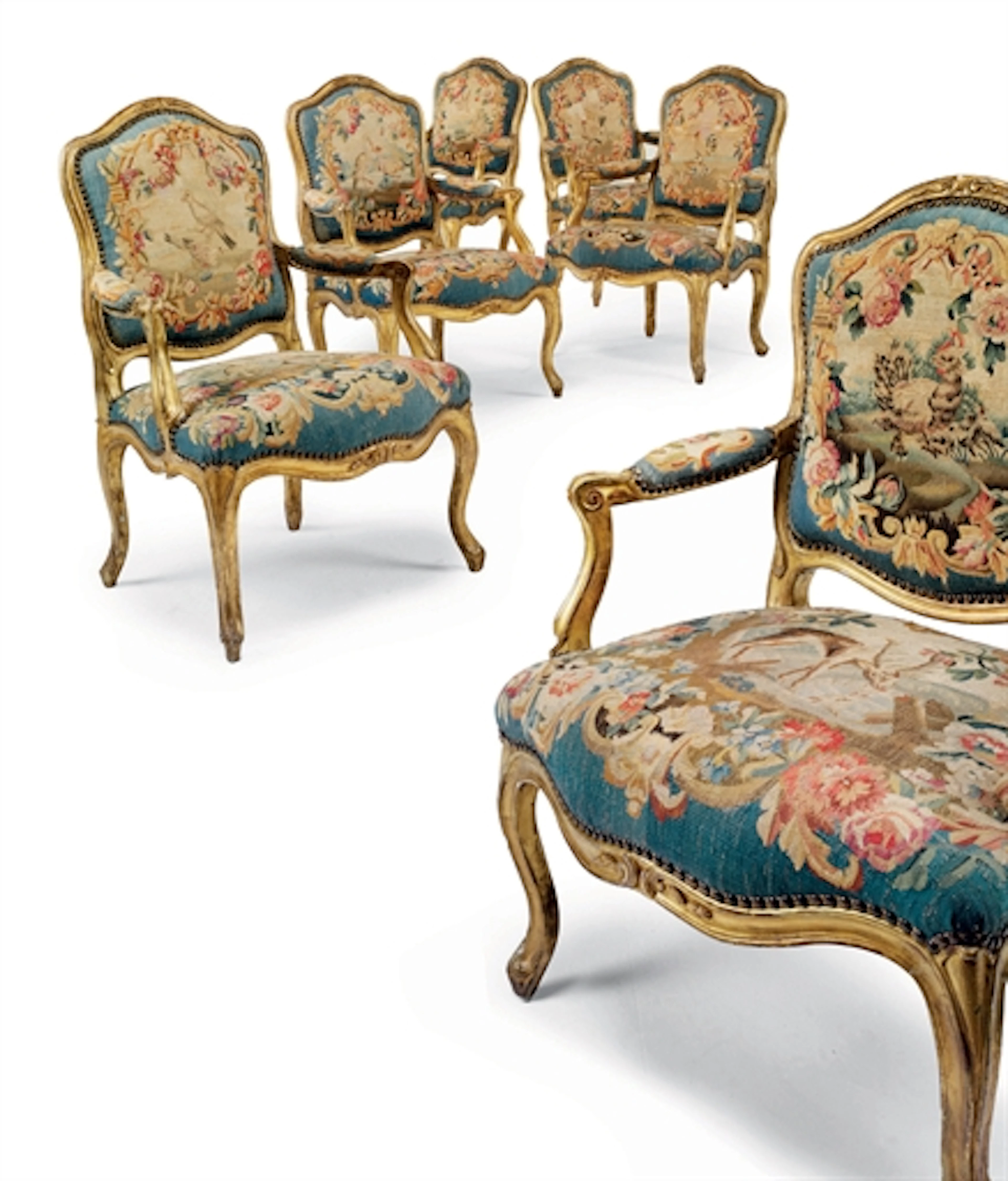 A SET OF SIX LOUIS XV GILTWOOD AND AUBUSSON TAPESTRY FAUTEUILS