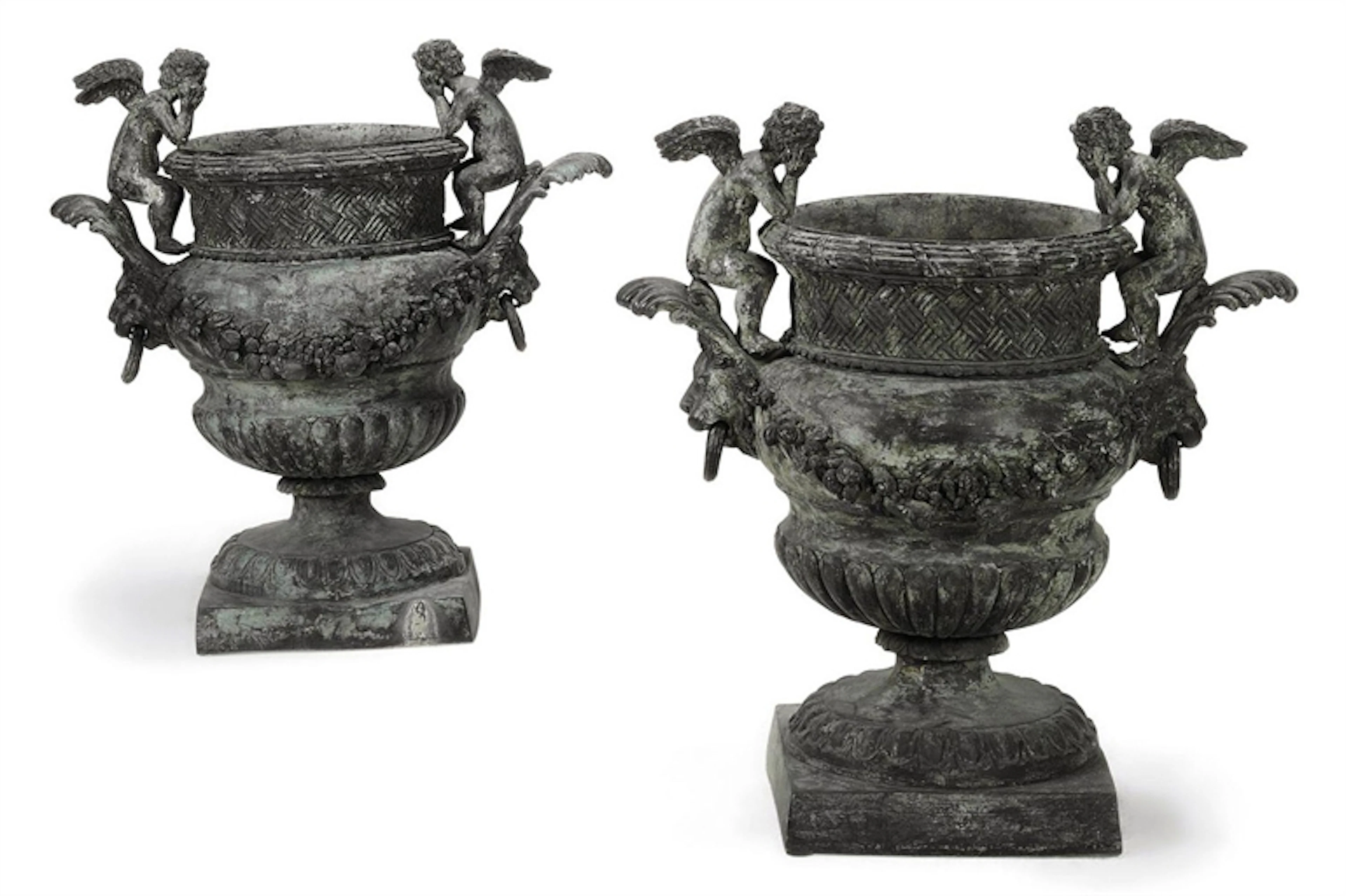 A PAIR OF BRONZE URNS