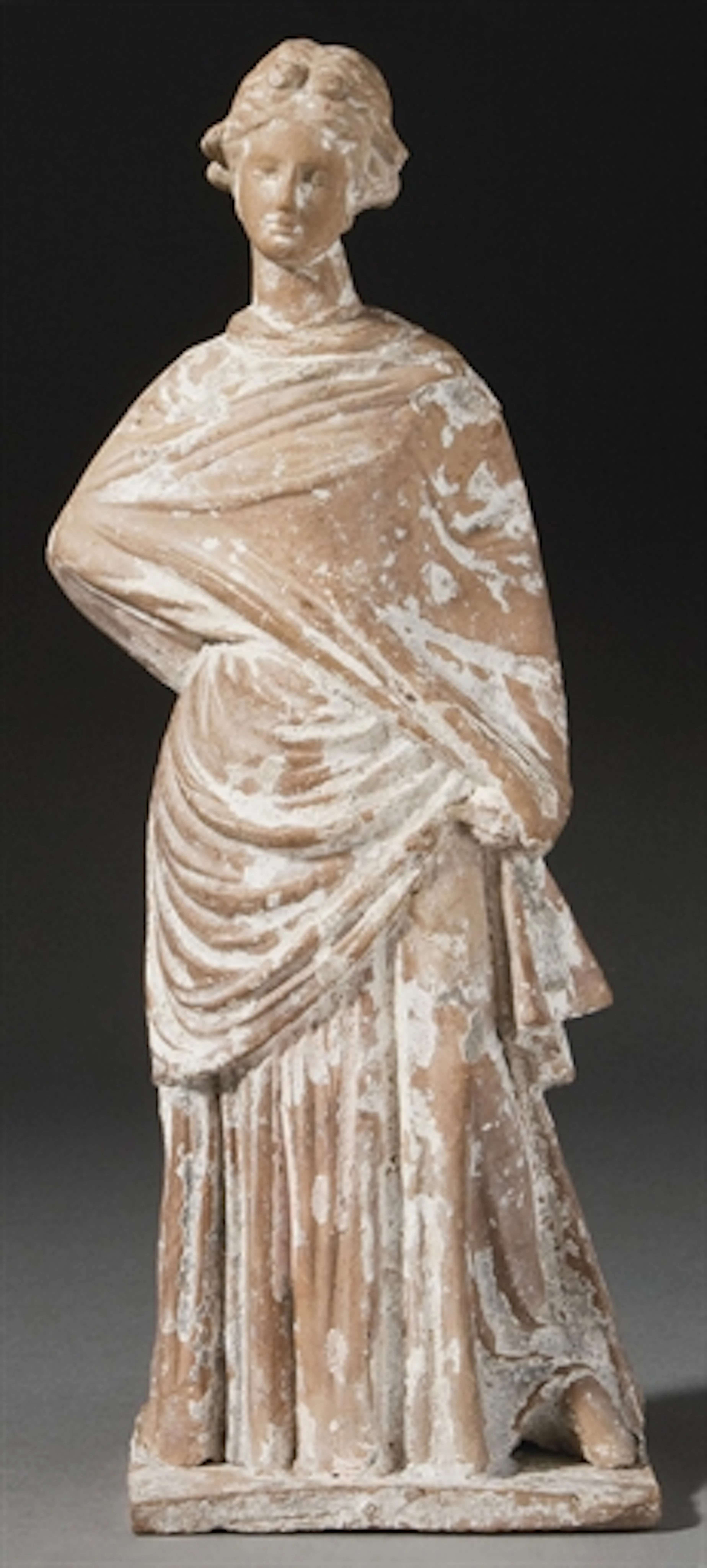 STATUETTE FEMININE EN TERRE CUITTE