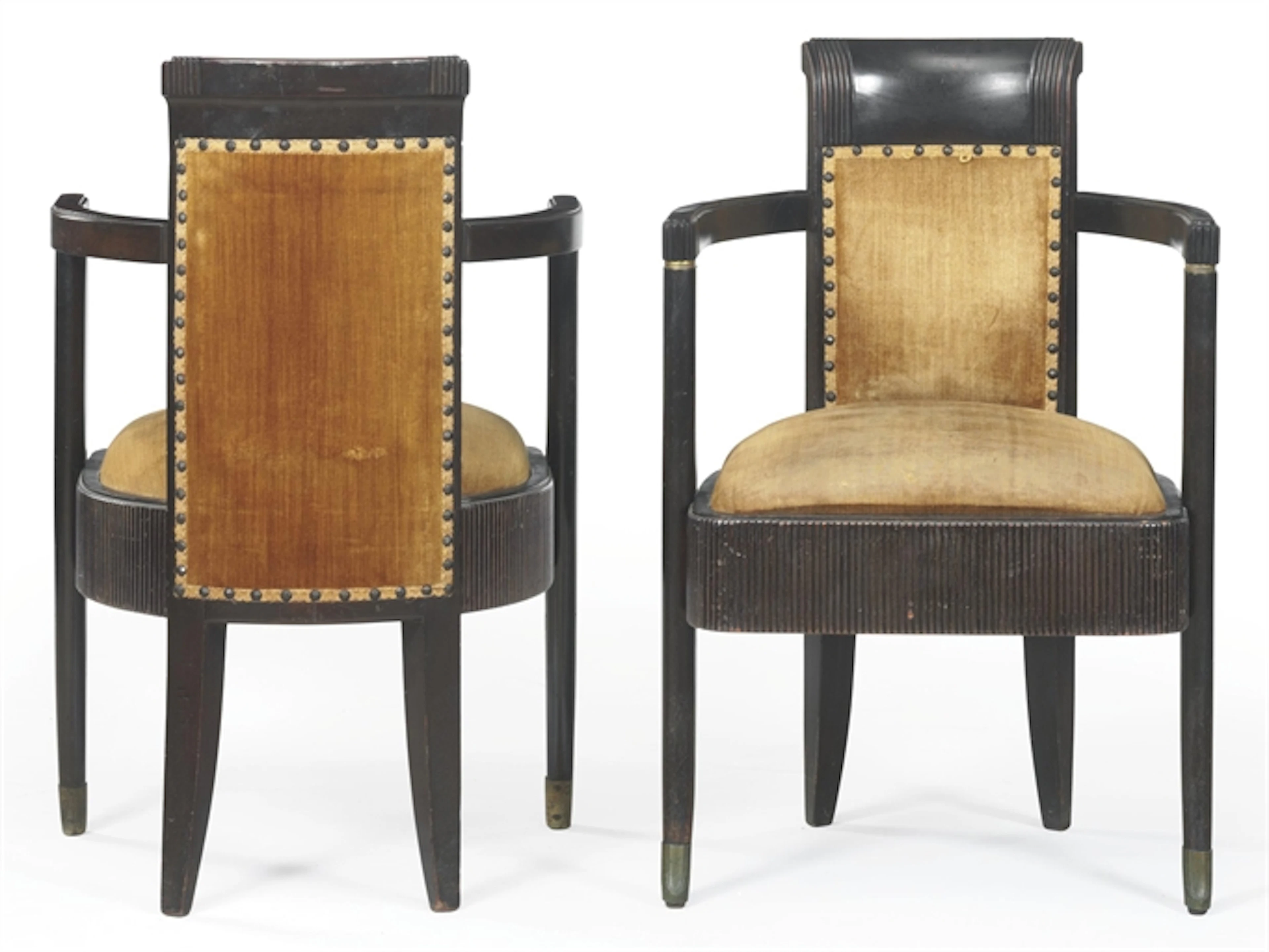 A PAIR OF UPHOLSTERED MAHOGANY ARMCHAIRS FROM THE FIRST-CLASS DINING ROOM OF THE S.S. NORMANDIE, CIRCA 1935