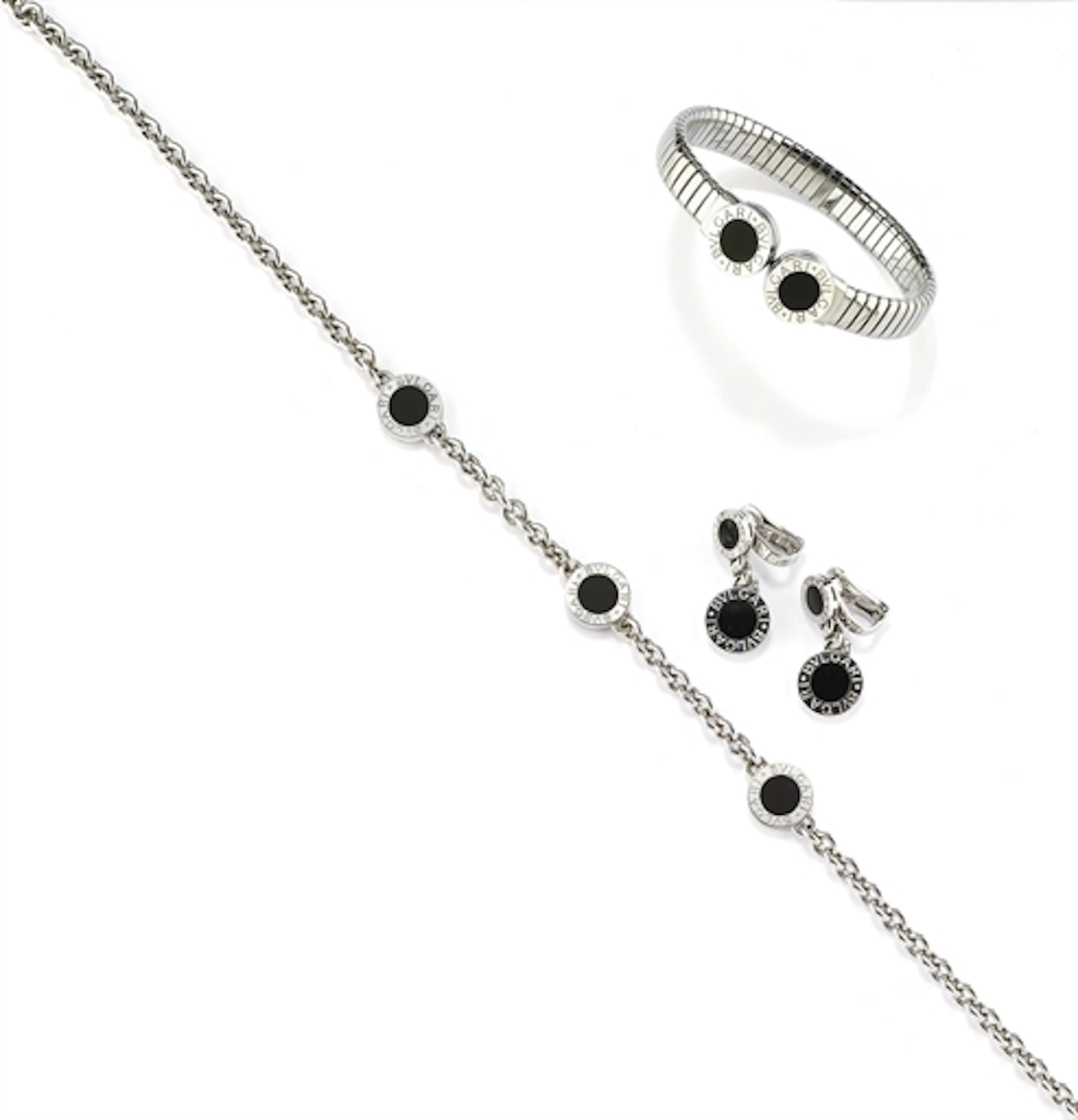 PARURE "BVLGARI-BVLGARI" IN ORO, ACCIAIO E ONICE, FIRMATA BULGARI