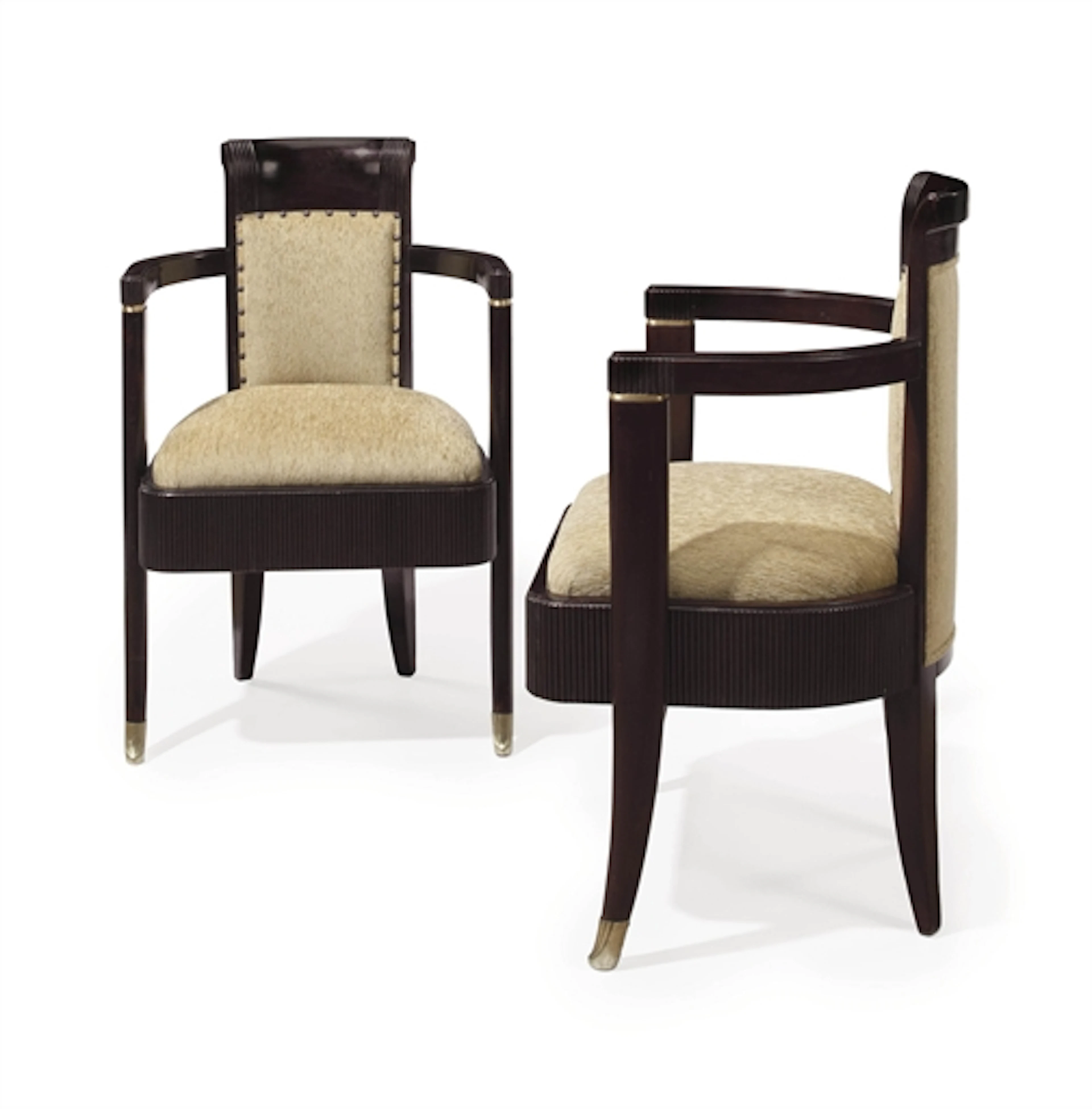 A PAIR OF UPHOLSTERED MAHOGANY ARMCHAIRS FROM THE FIRST-CLASS DINING ROOM OF THE S.S. NORMANDIE, CIRCA 1935