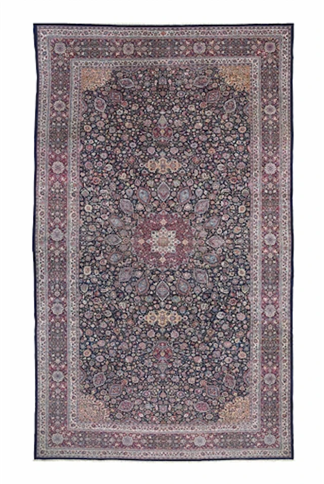 A LARGE MESHED CARPET