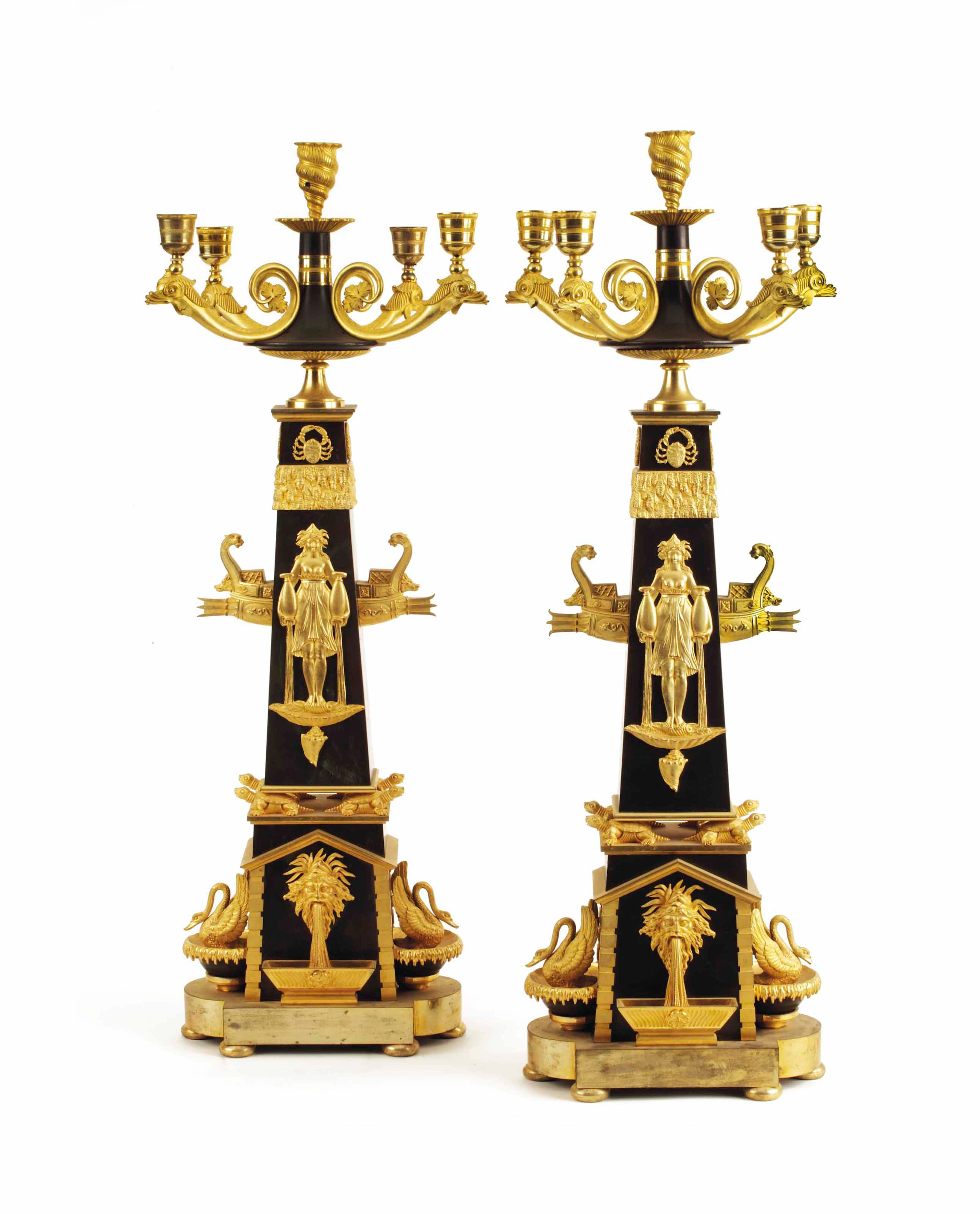 A PAIR OF RUSSIAN ORMOLU AND PATINATED BRONZE FIVE LIGHT GIRANDOLES