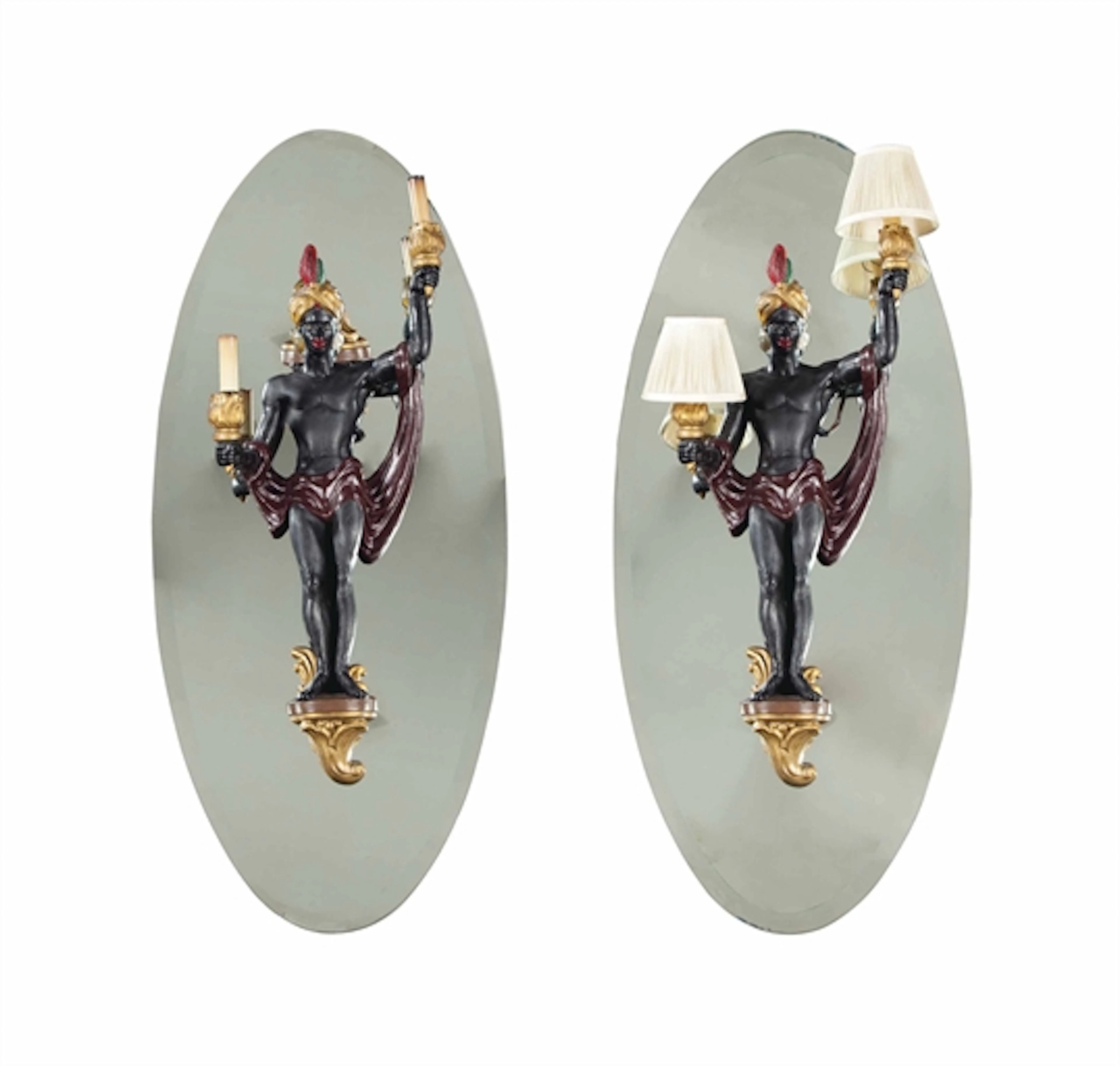 A SET OF FOUR PAINTED WOOD TWO-LIGHT WALL LIGHTS MODELED AS AFRICANS,