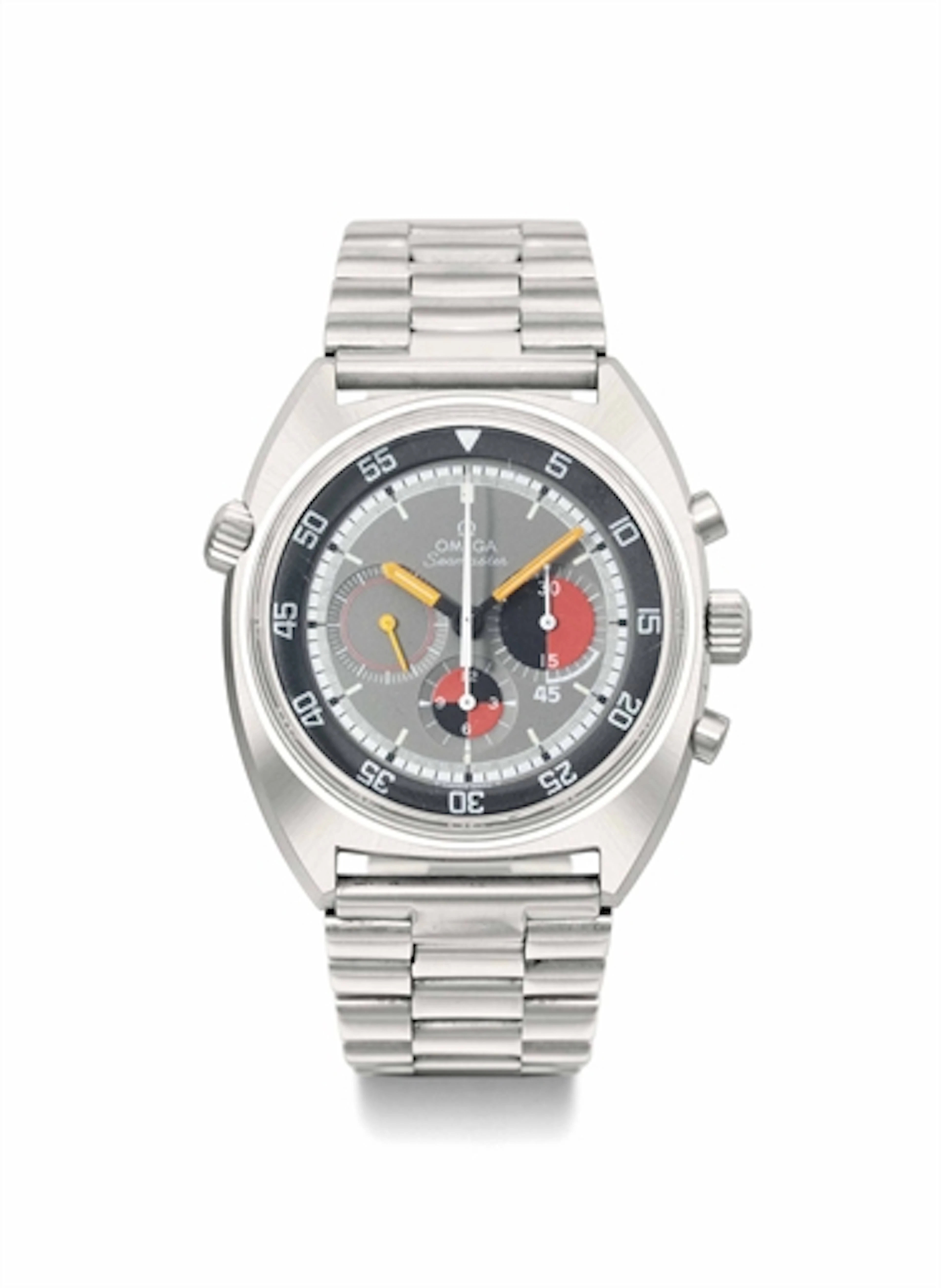 Omega. A rare stainless steel tonneau-shaped chronograph wristwatch with multi-coloured dial and bracelet