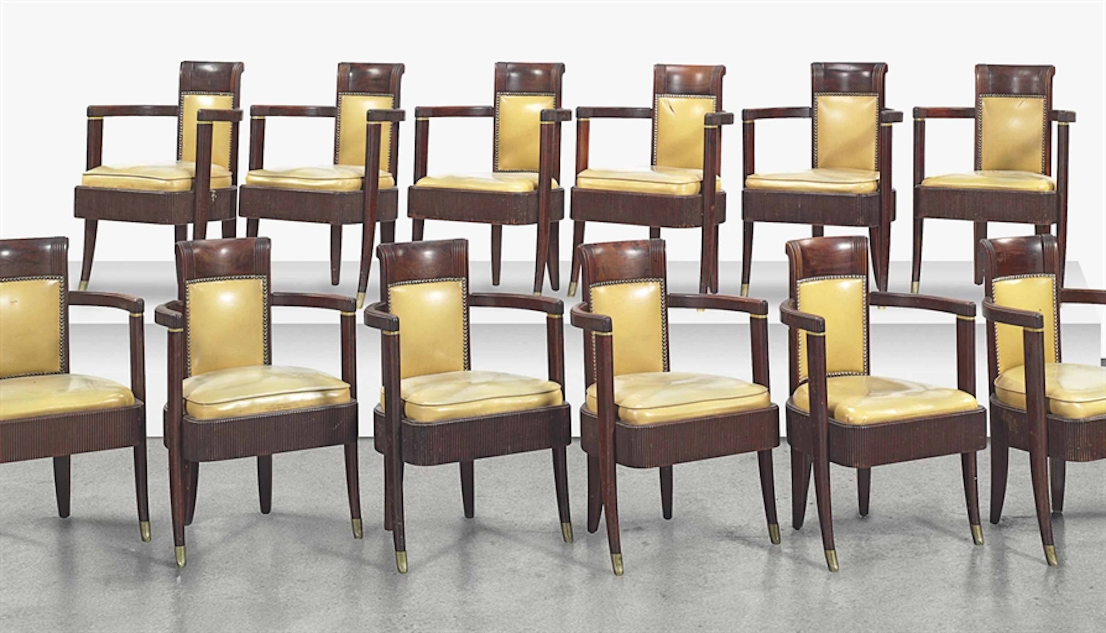 A SET OF TWELVE ARMCHAIRS, CIRCA 1934