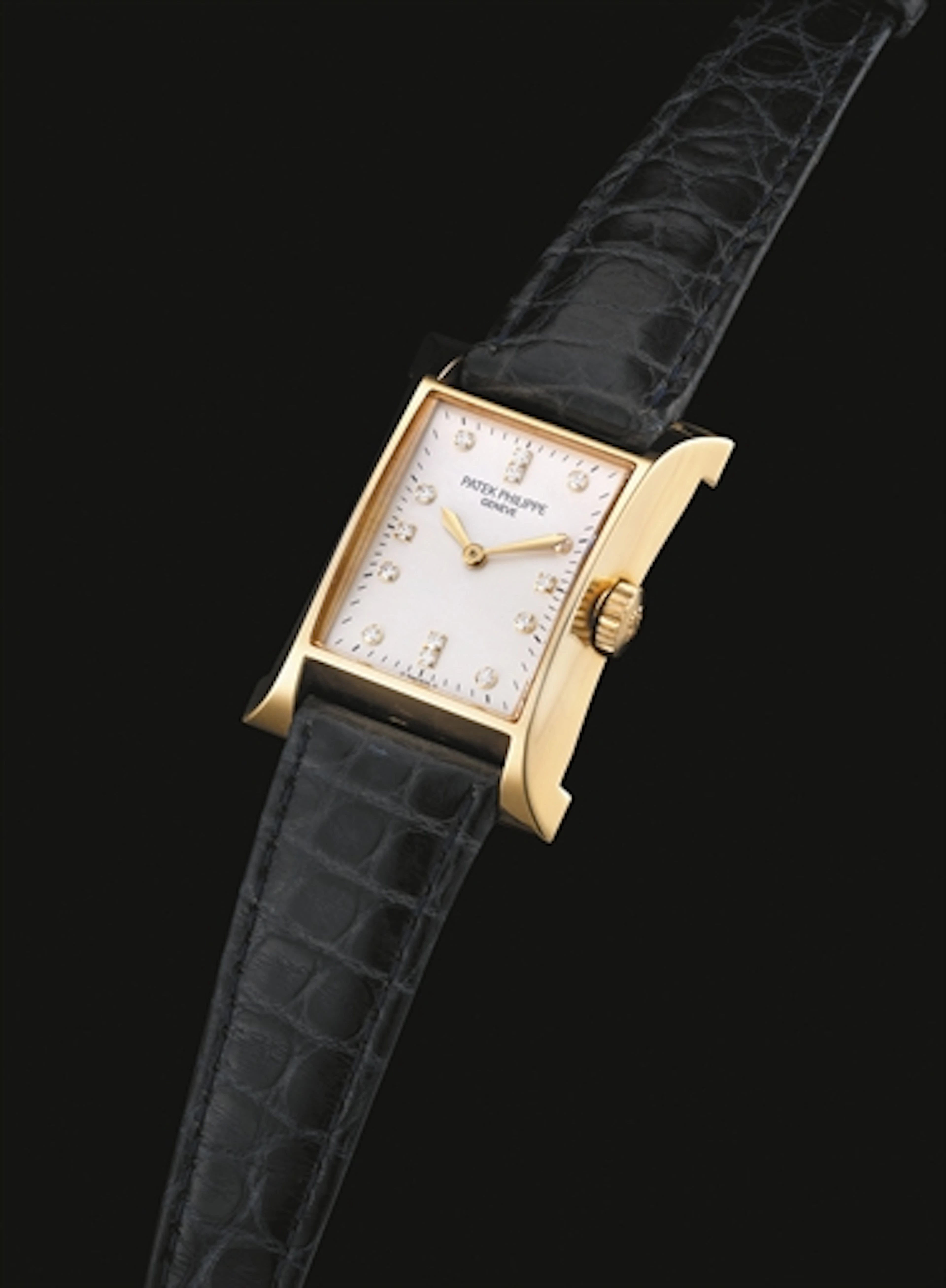 PATEK PHILIPPE. A LADY'S FINE 18K GOLD AND DIAMOND-SET LIMITED EDITION RECTANGULAR WRISTWATCH, MADE TO COMMEMORATE THE OPENING OF PATEK PHILIPPE'S WATCHMAKING CENTRE IN GENEVA IN 1997