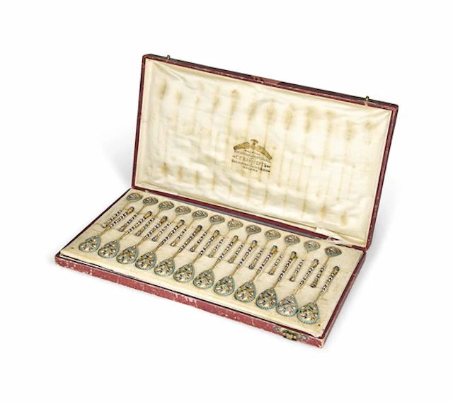 A SET OF TWELVE RUSSIAN SILVER-GILT AND CLOISONNÉ ENAMEL LEMON TEA SPOONS AND TWELVE COFFEE SPOONS EN SUITE