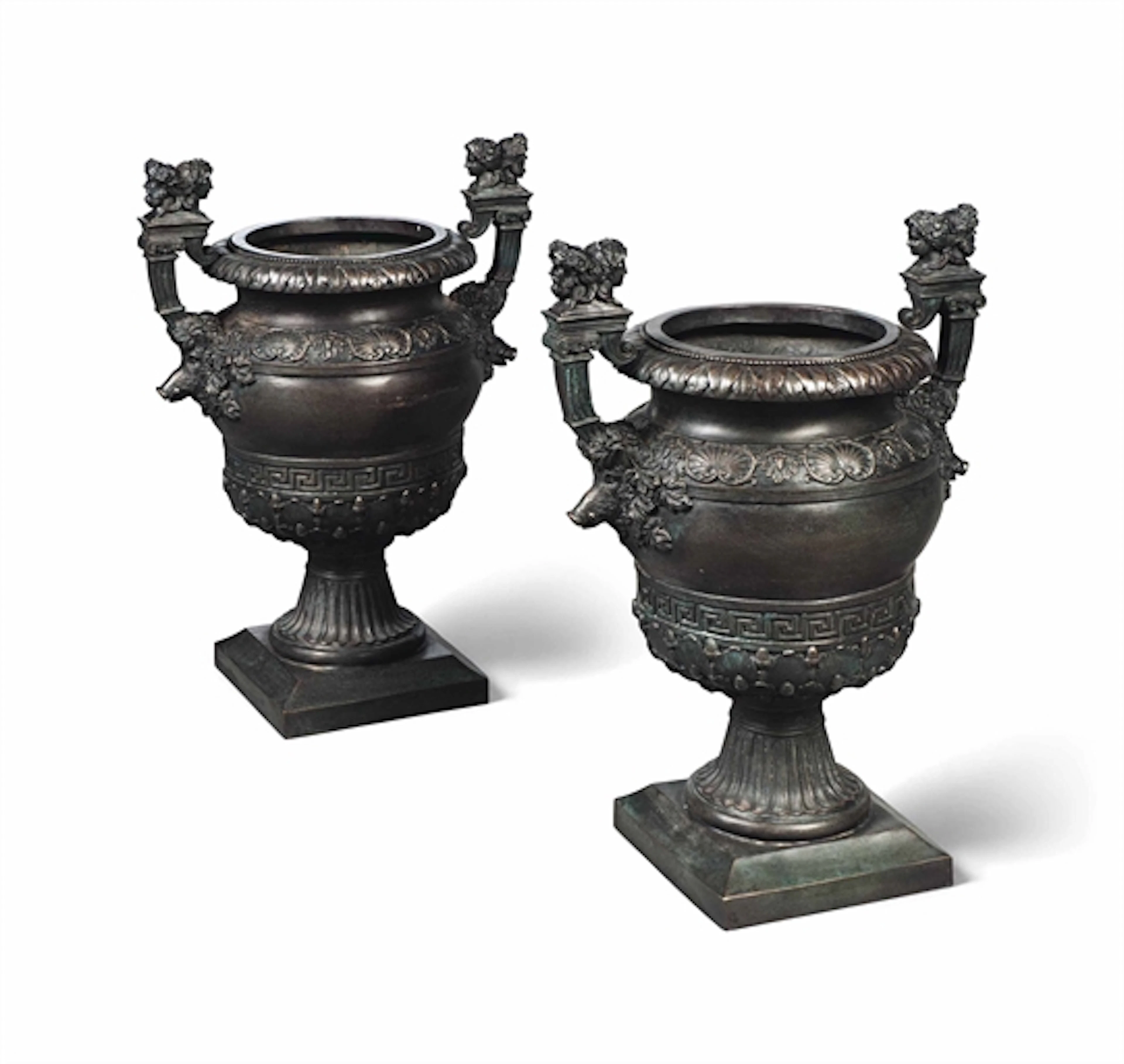 A PAIR OF BRONZE GARDEN URNS